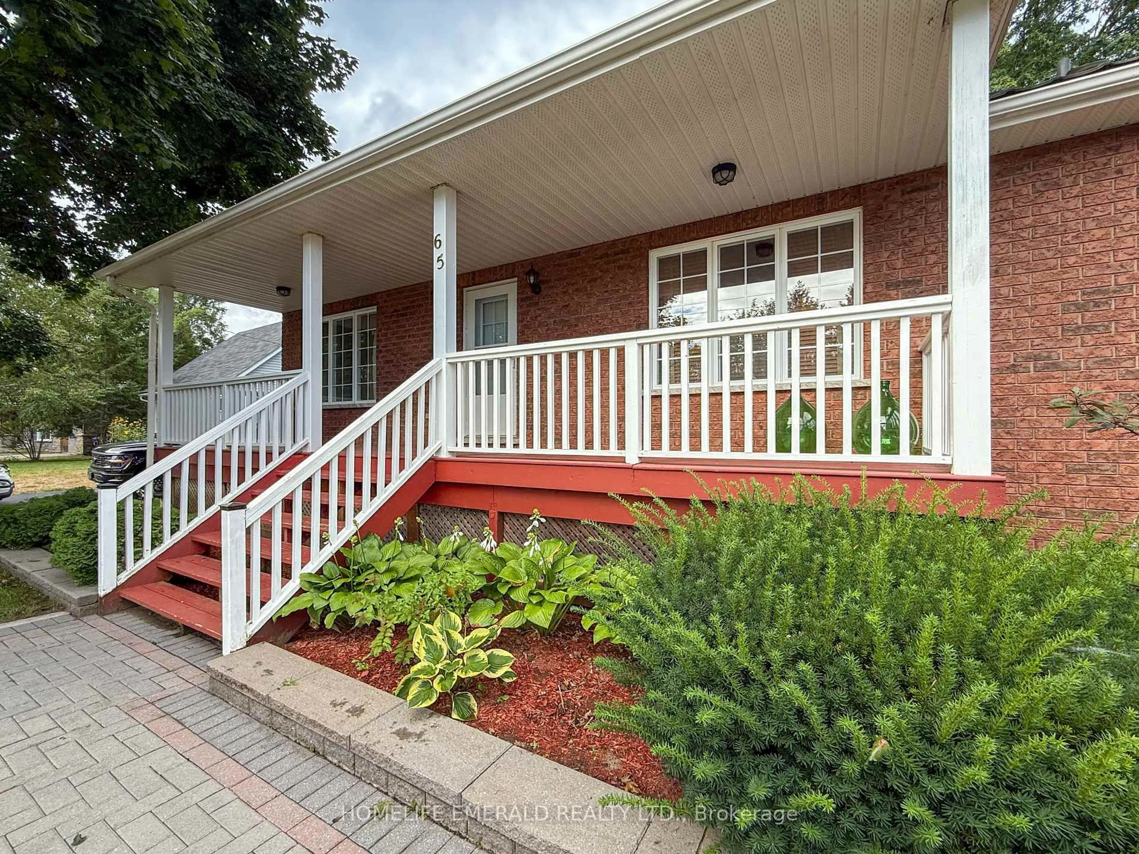 Home with vinyl exterior material, street for 65 Vernon St, Essa Ontario L0M 1B0