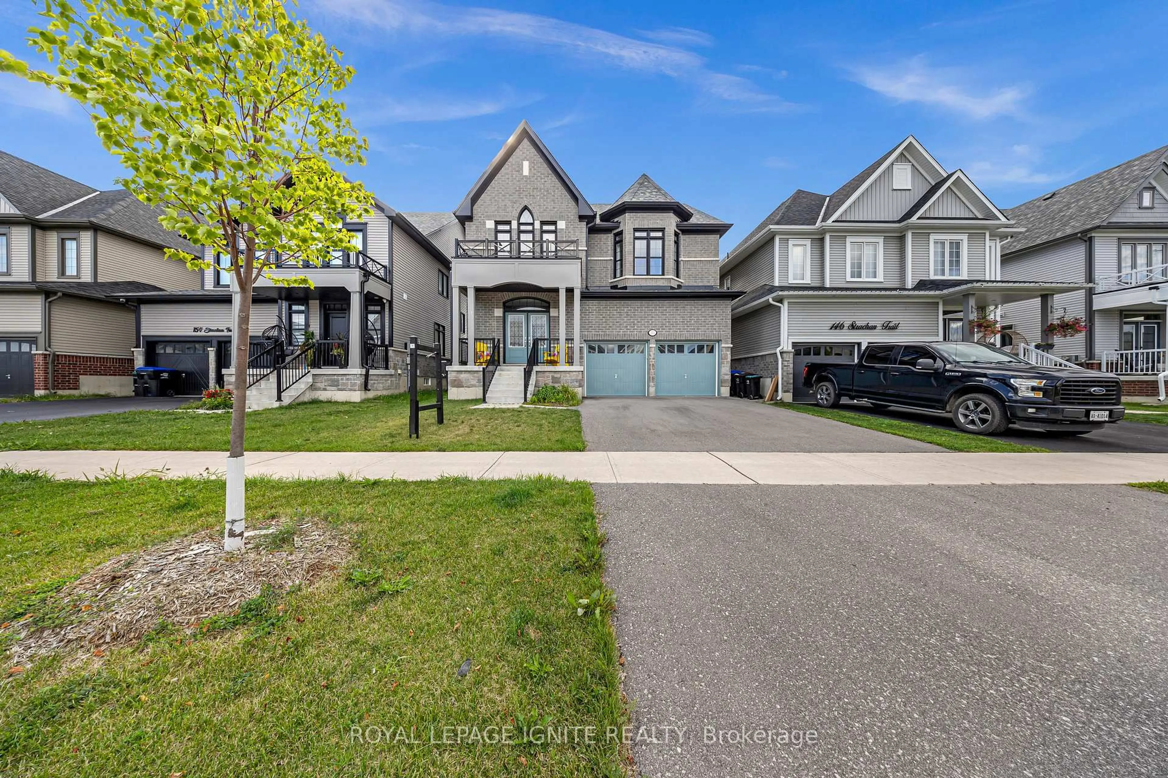 A pic from outside/outdoor area/front of a property/back of a property/a pic from drone, street for 150 Strachan Tr, New Tecumseth Ontario L0G 1A0