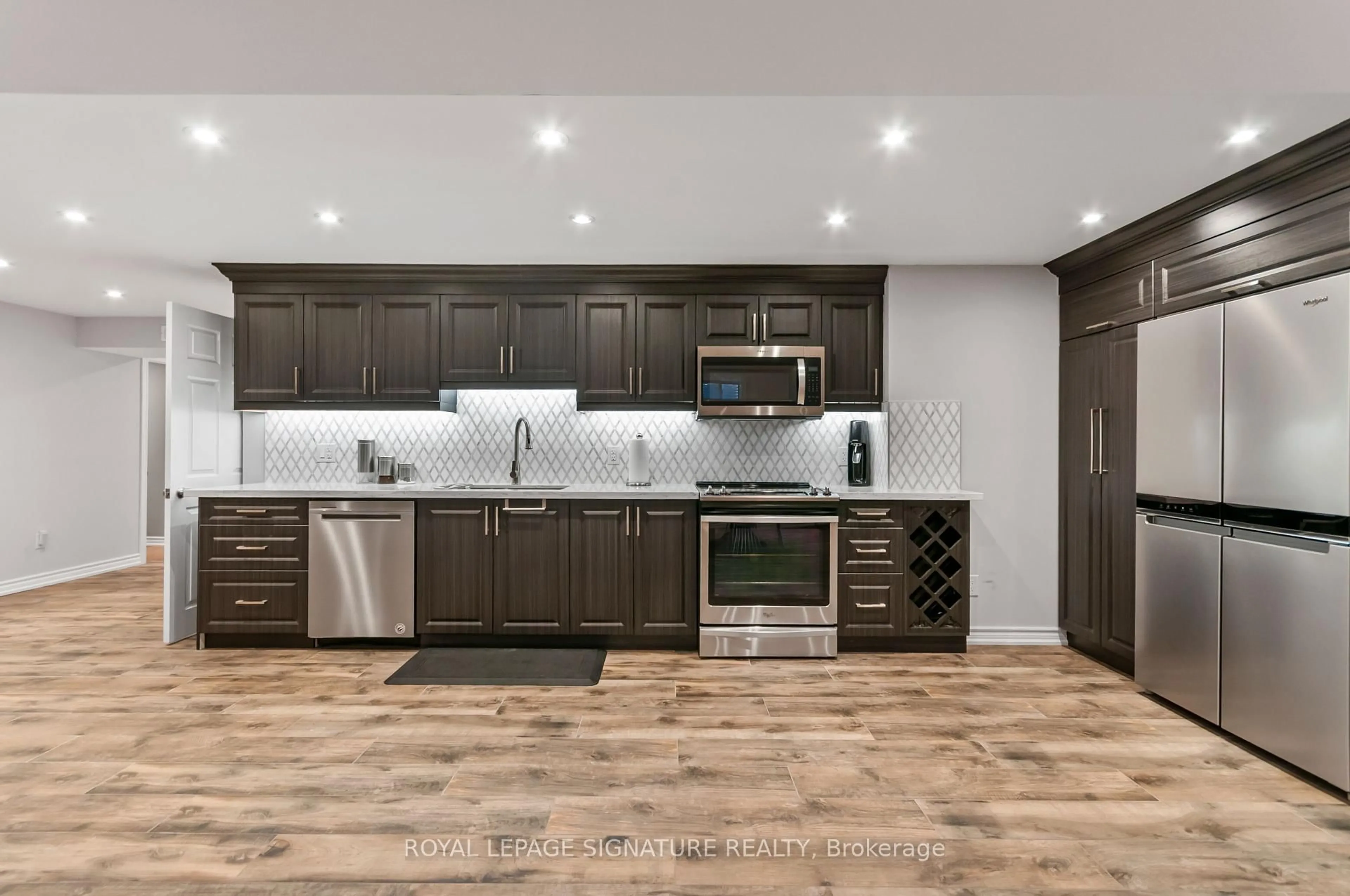 Open concept kitchen, unknown for 80 Sharpe Cres, New Tecumseth Ontario L0G 1W0