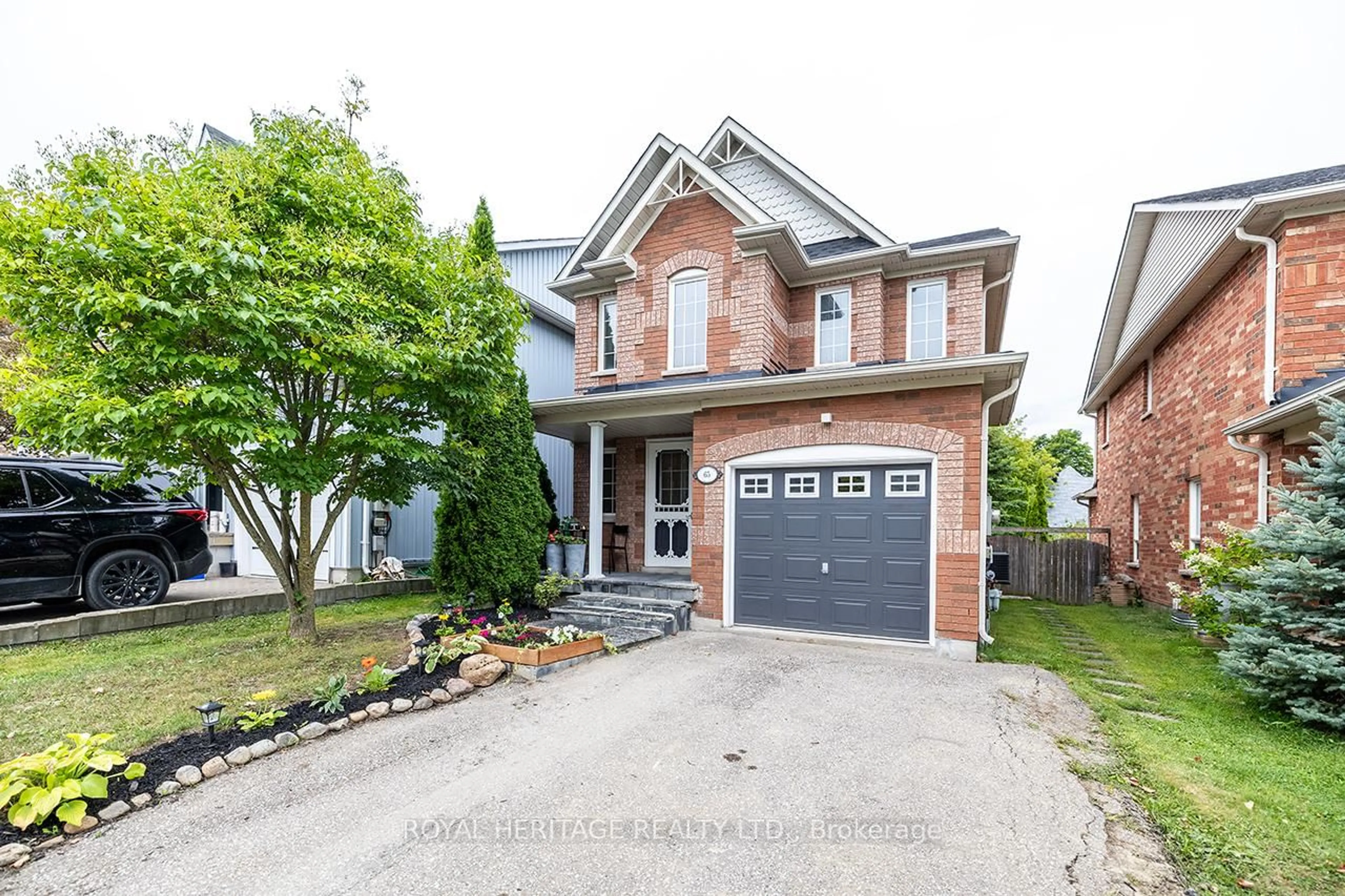 Home with brick exterior material, street for 65 Margaret Graham Cres, East Gwillimbury Ontario L0G 1M0