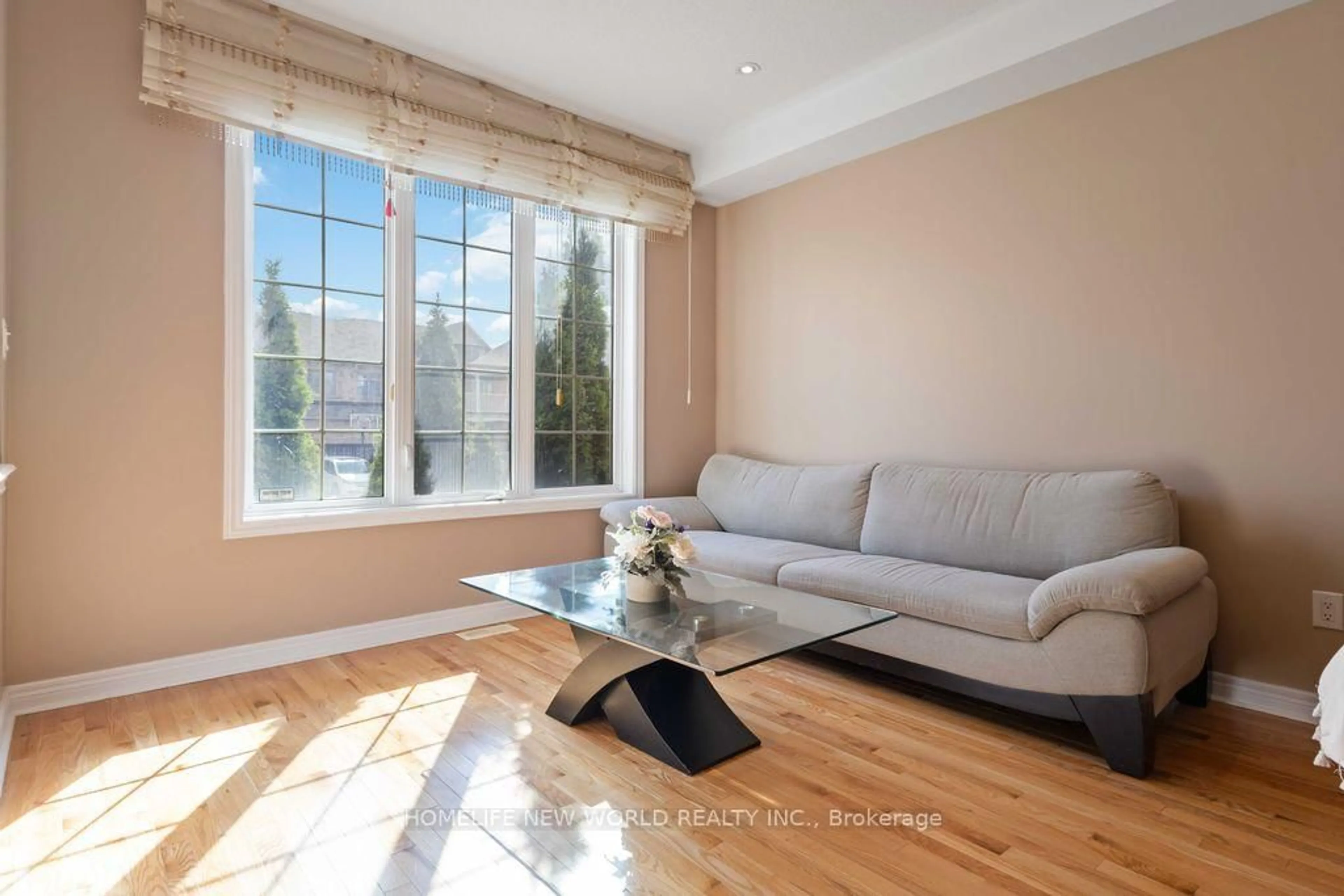 Living room with furniture, wood/laminate floor for 332 Williamson Rd, Markham Ontario L6E 0H2