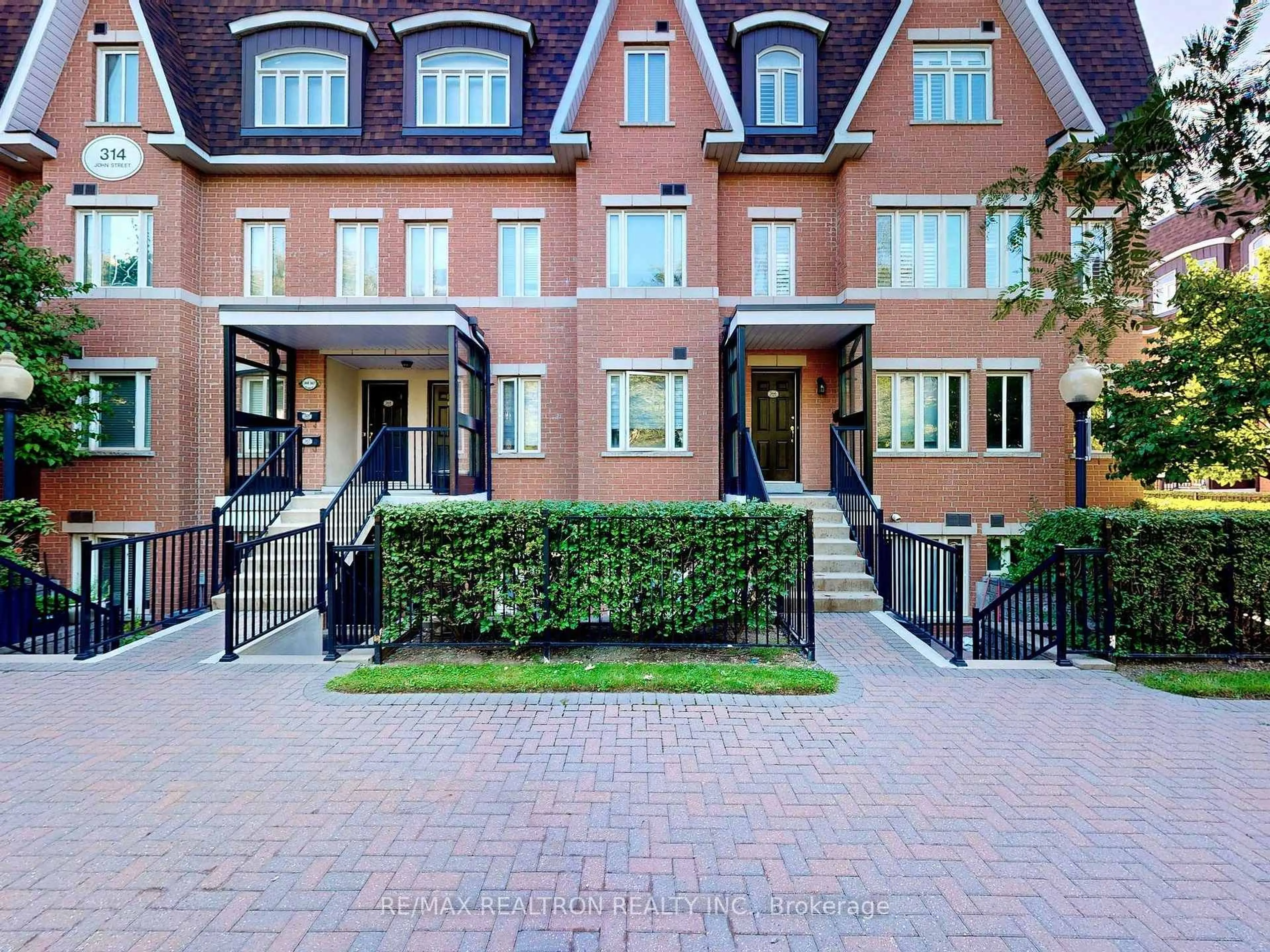 Home with brick exterior material, street for 314 John St #366, Markham Ontario L3T 0A7