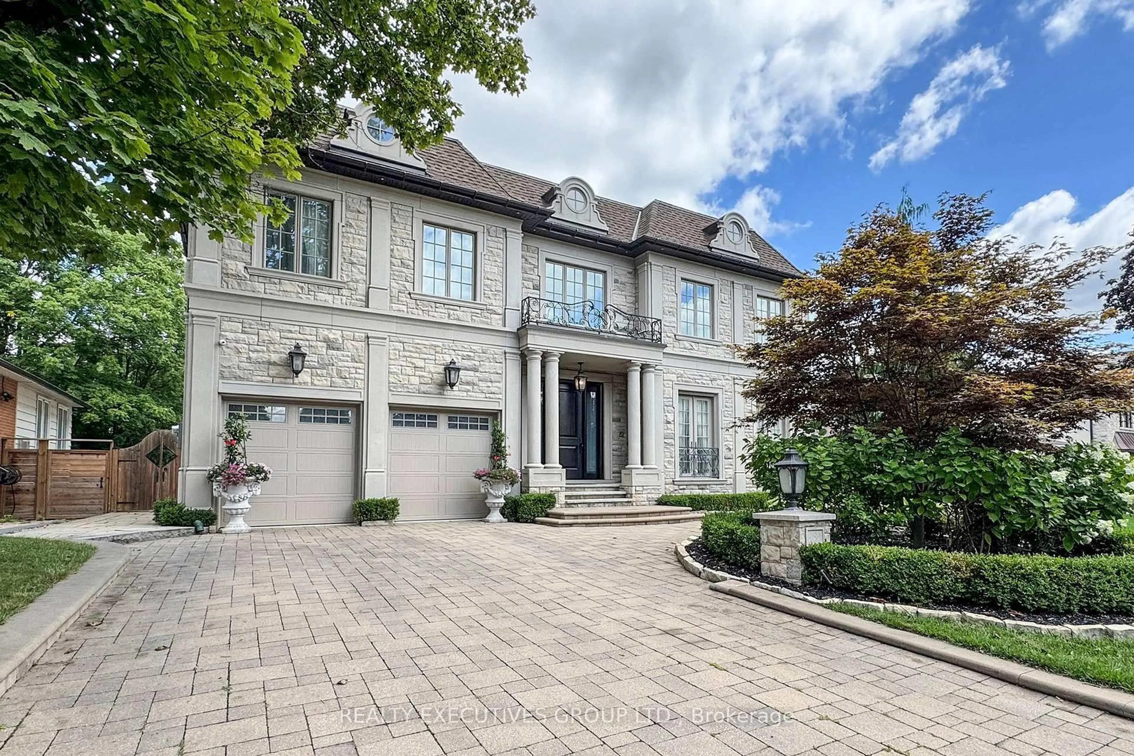 Home with brick exterior material, street for 169 Bay Thorn Dr, Markham Ontario L3T 3V2