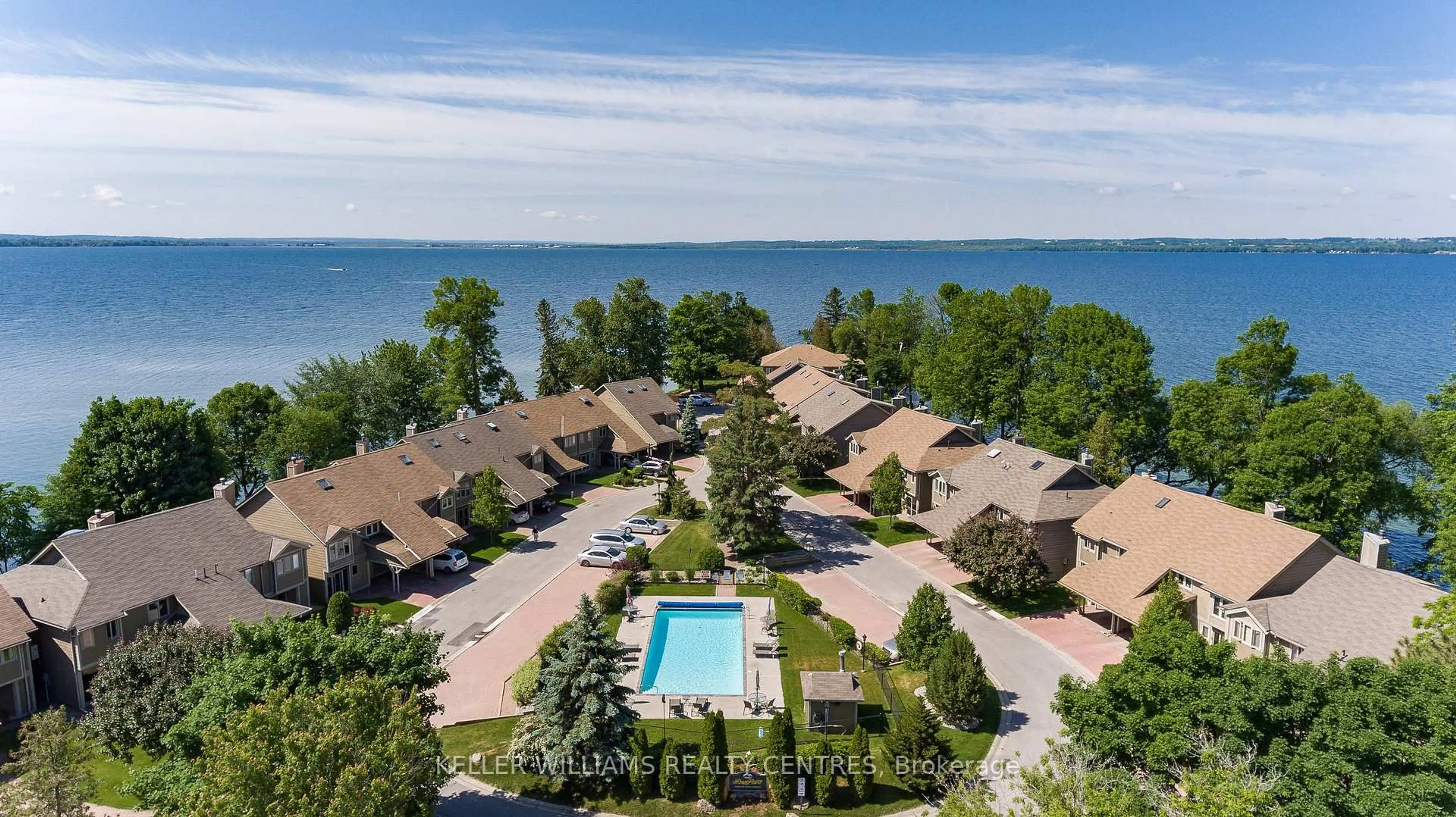 A pic from outside/outdoor area/front of a property/back of a property/a pic from drone, water/lake/river/ocean view for 17 Davy Point Circ, Georgina Ontario L4P 3H2