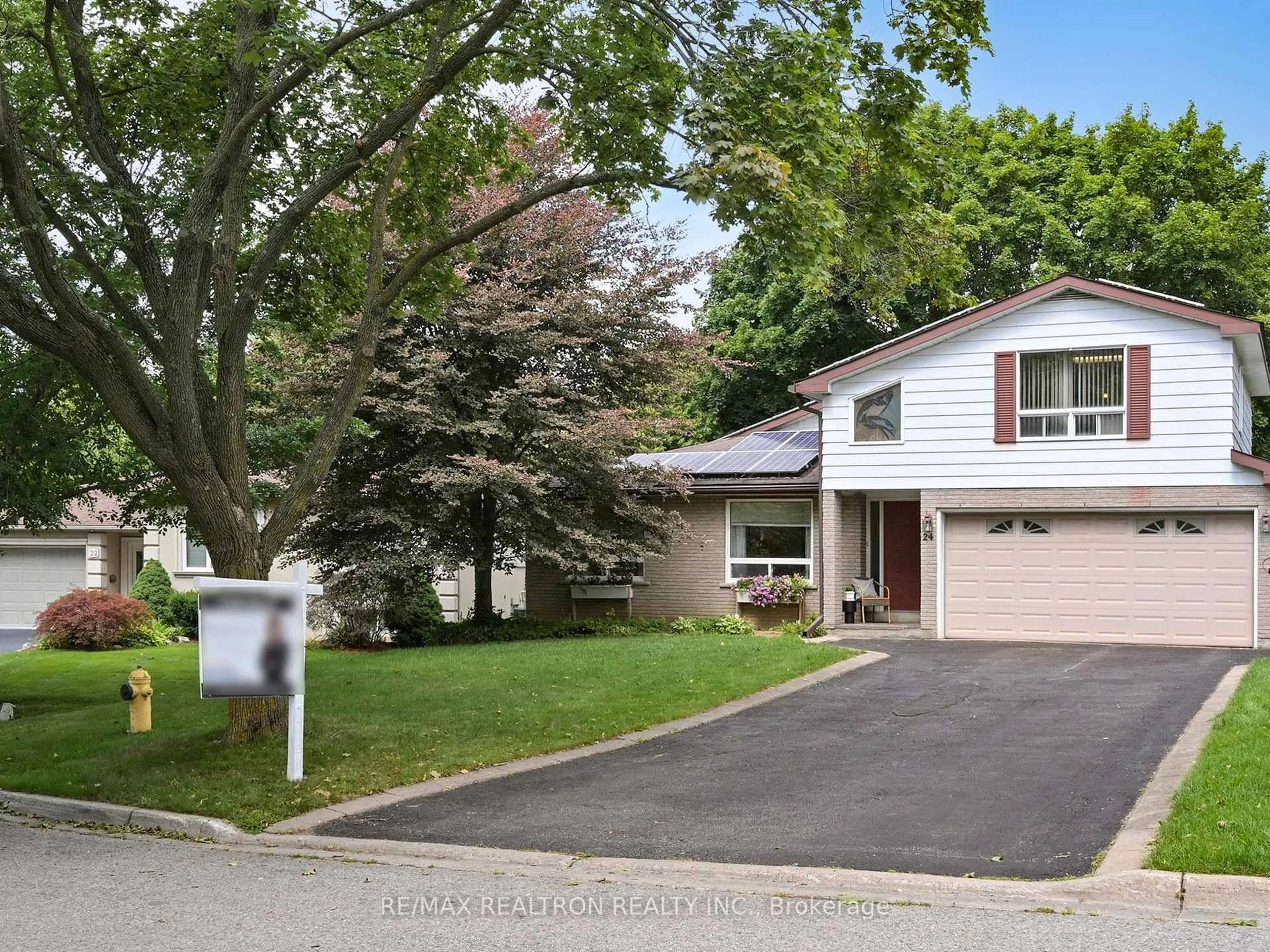 Home with vinyl exterior material, street for 24 Castle Harbour Lane, Markham Ontario L3T 3A2