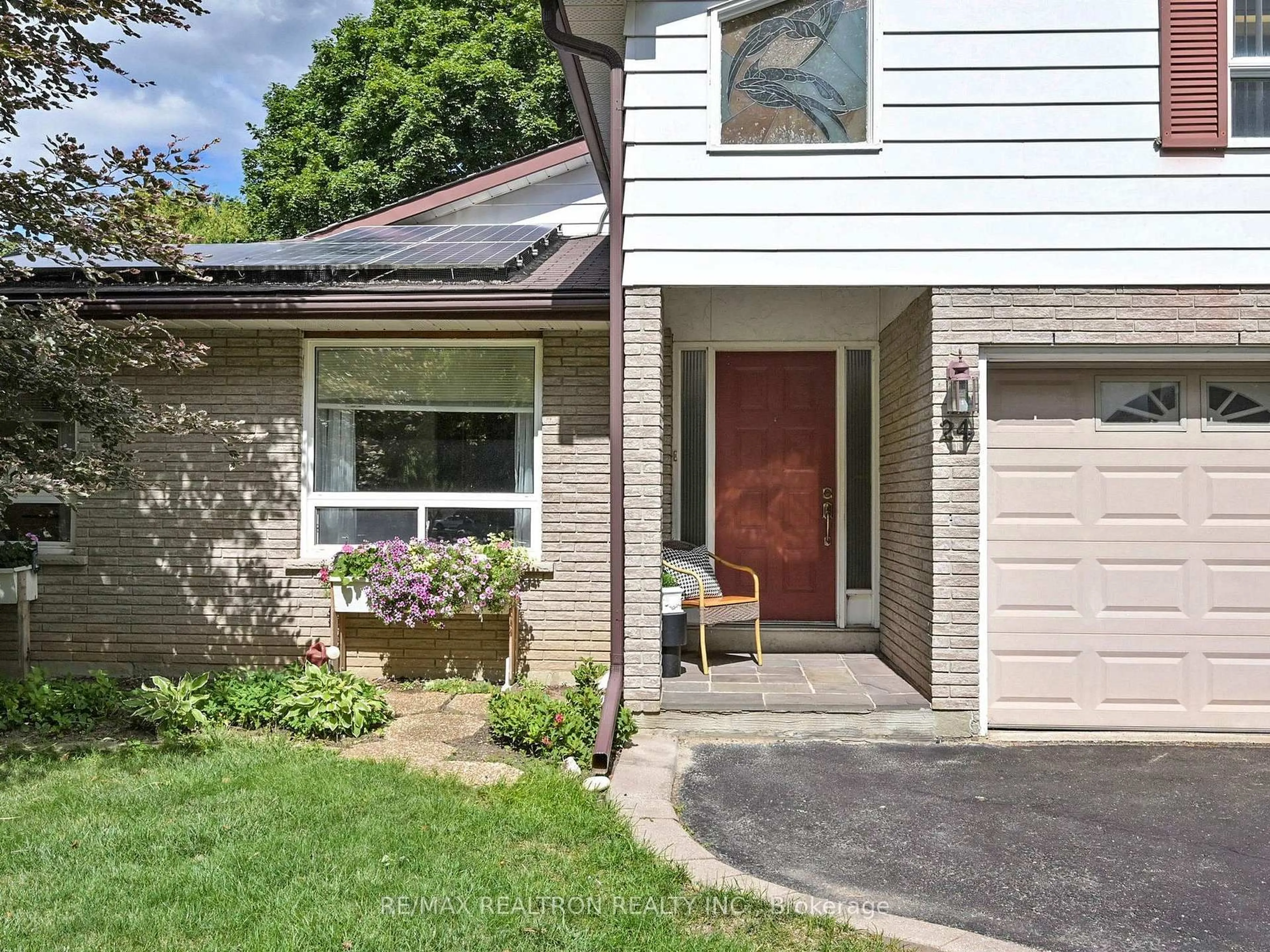 Home with brick exterior material, street for 24 Castle Harbour Lane, Markham Ontario L3T 3A2