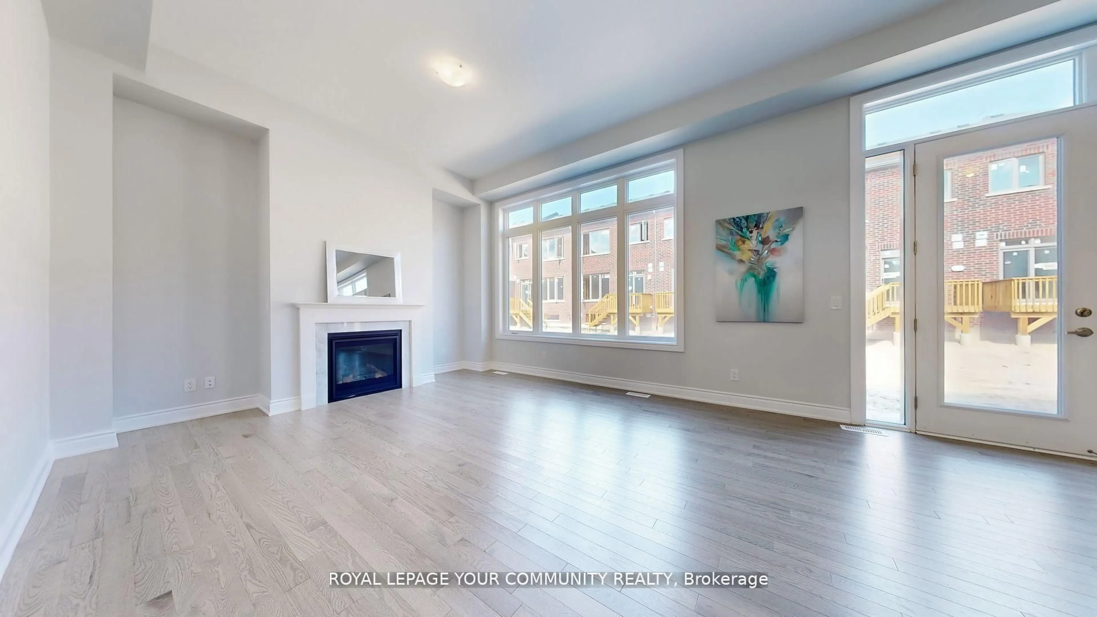 Living room with furniture, wood/laminate floor for 158 Harvey Bunker Cres, Markham Ontario L6C 3M8