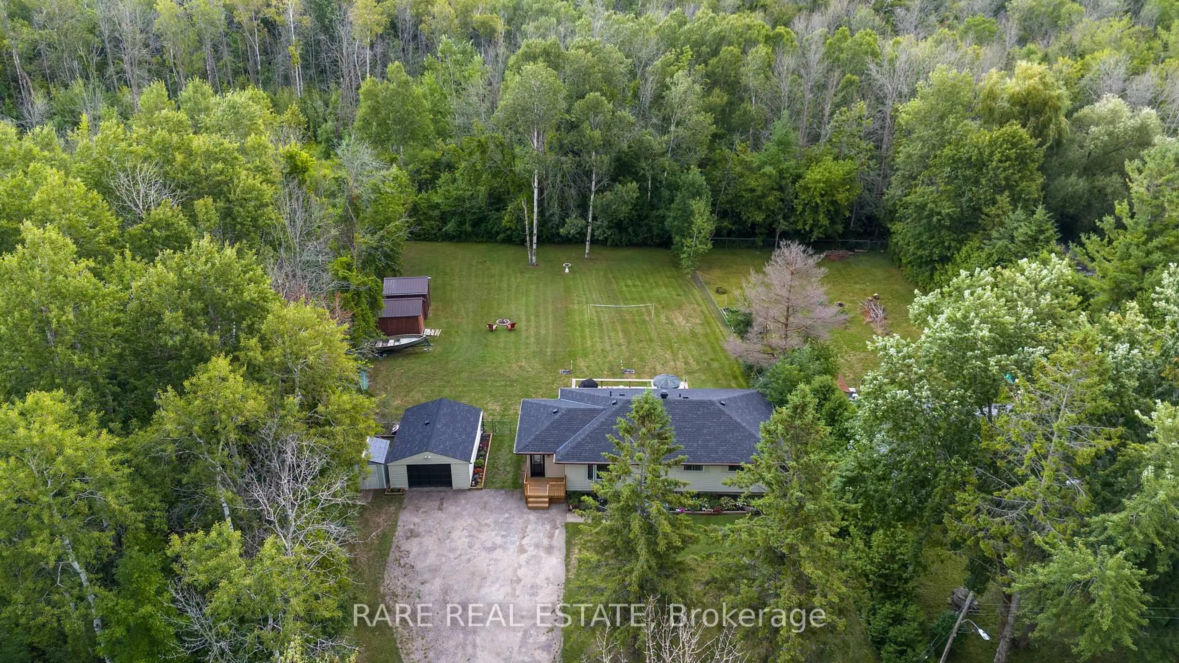 A pic from outside/outdoor area/front of a property/back of a property/a pic from drone, forest/trees view for 1121 Ferrier Ave, Innisfil Ontario L0L 1W0