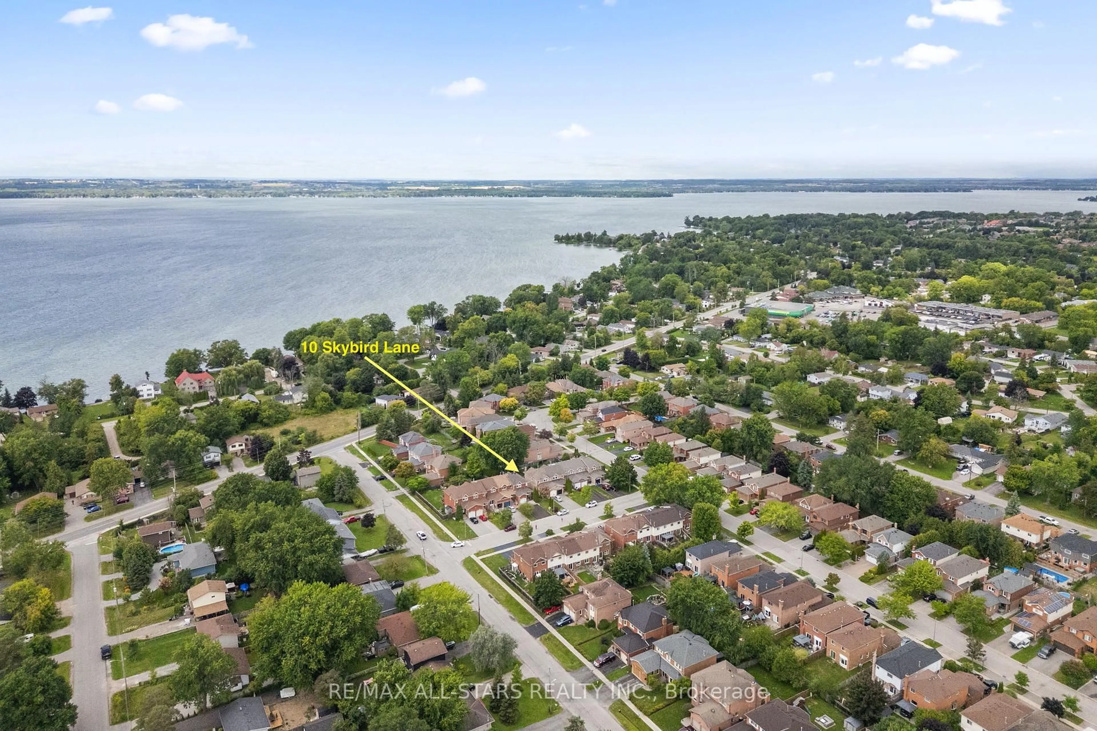 A pic from outside/outdoor area/front of a property/back of a property/a pic from drone, water/lake/river/ocean view for 10 Skybird Lane, Georgina Ontario L4P 3S1