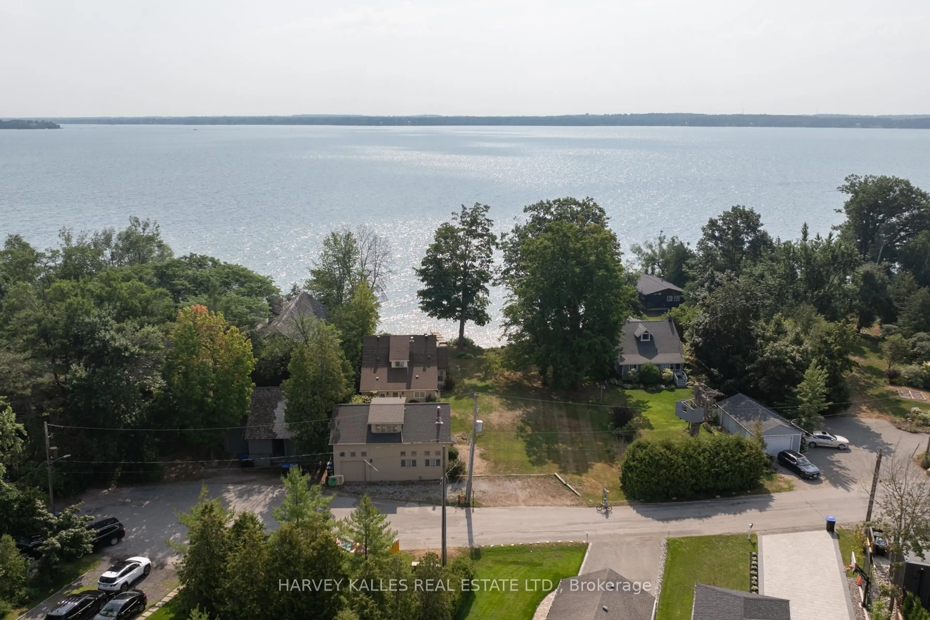 A pic from outside/outdoor area/front of a property/back of a property/a pic from drone, water/lake/river/ocean view for 607 Cedarvale Dr, Innisfil Ontario L9S 4L1