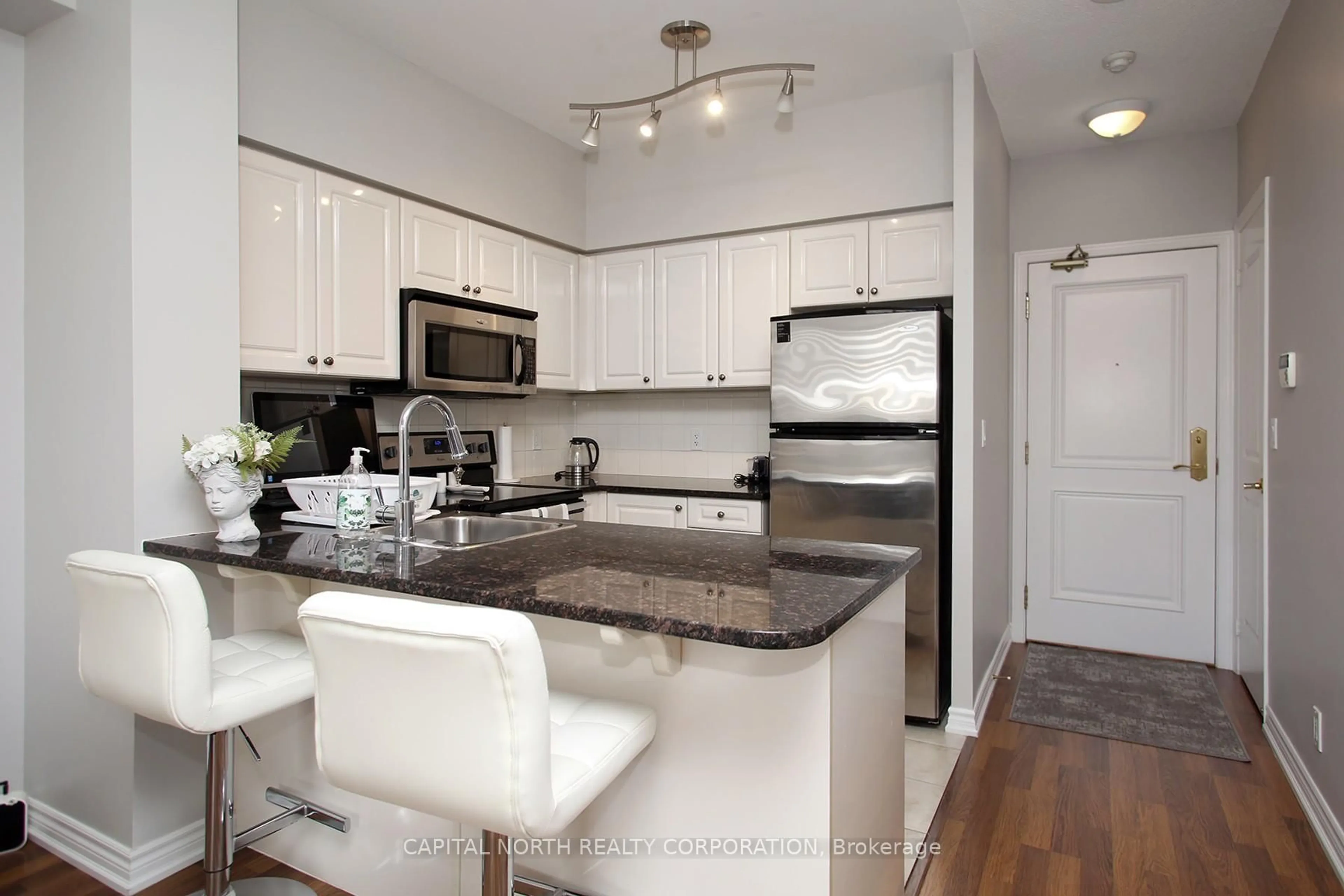 Open concept kitchen, unknown for 9225 Jane St #715, Vaughan Ontario L6A 0J7