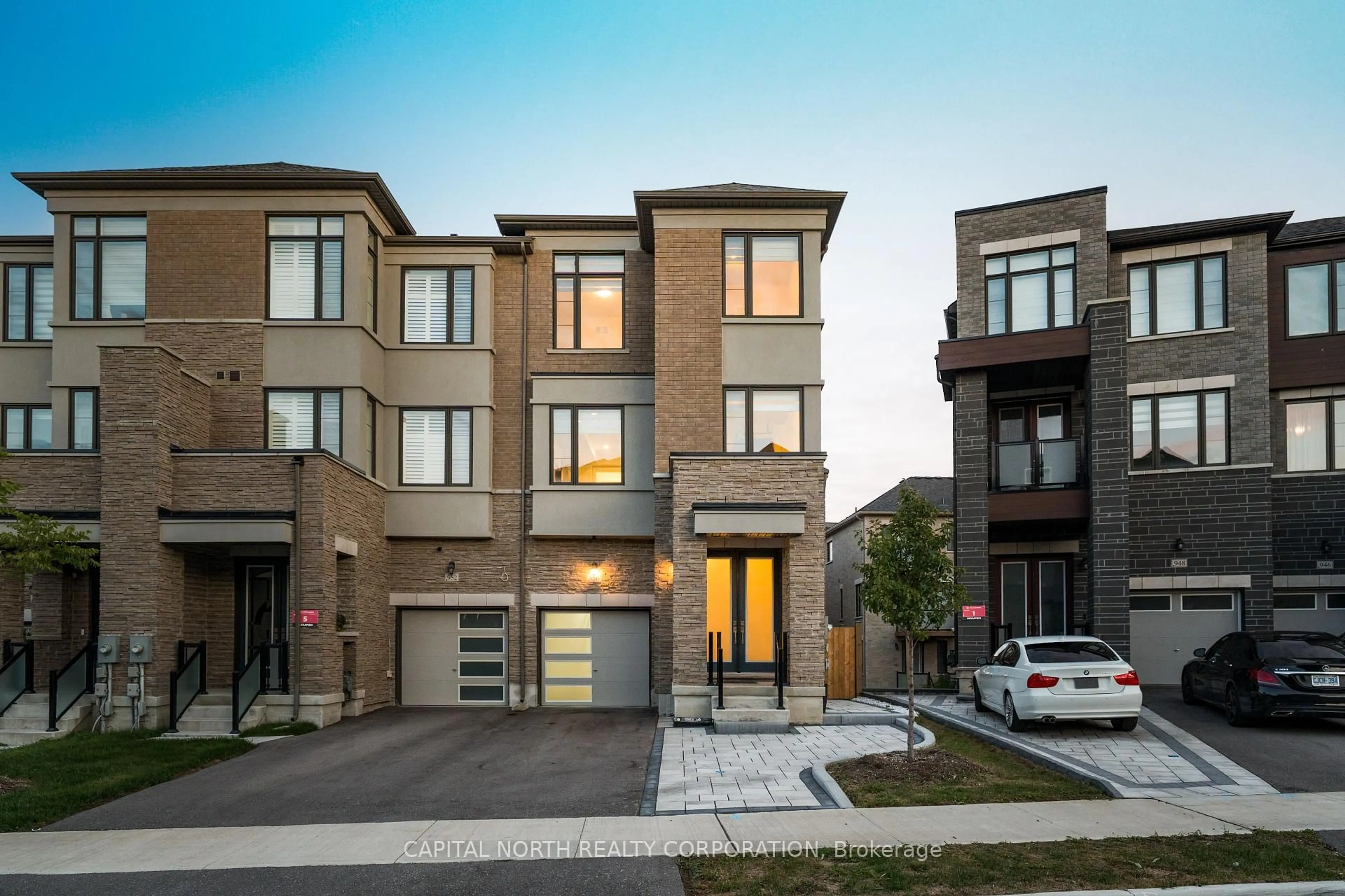 Home with brick exterior material, street for 950 Isaac Phillips Way, Newmarket Ontario L3X 0M7
