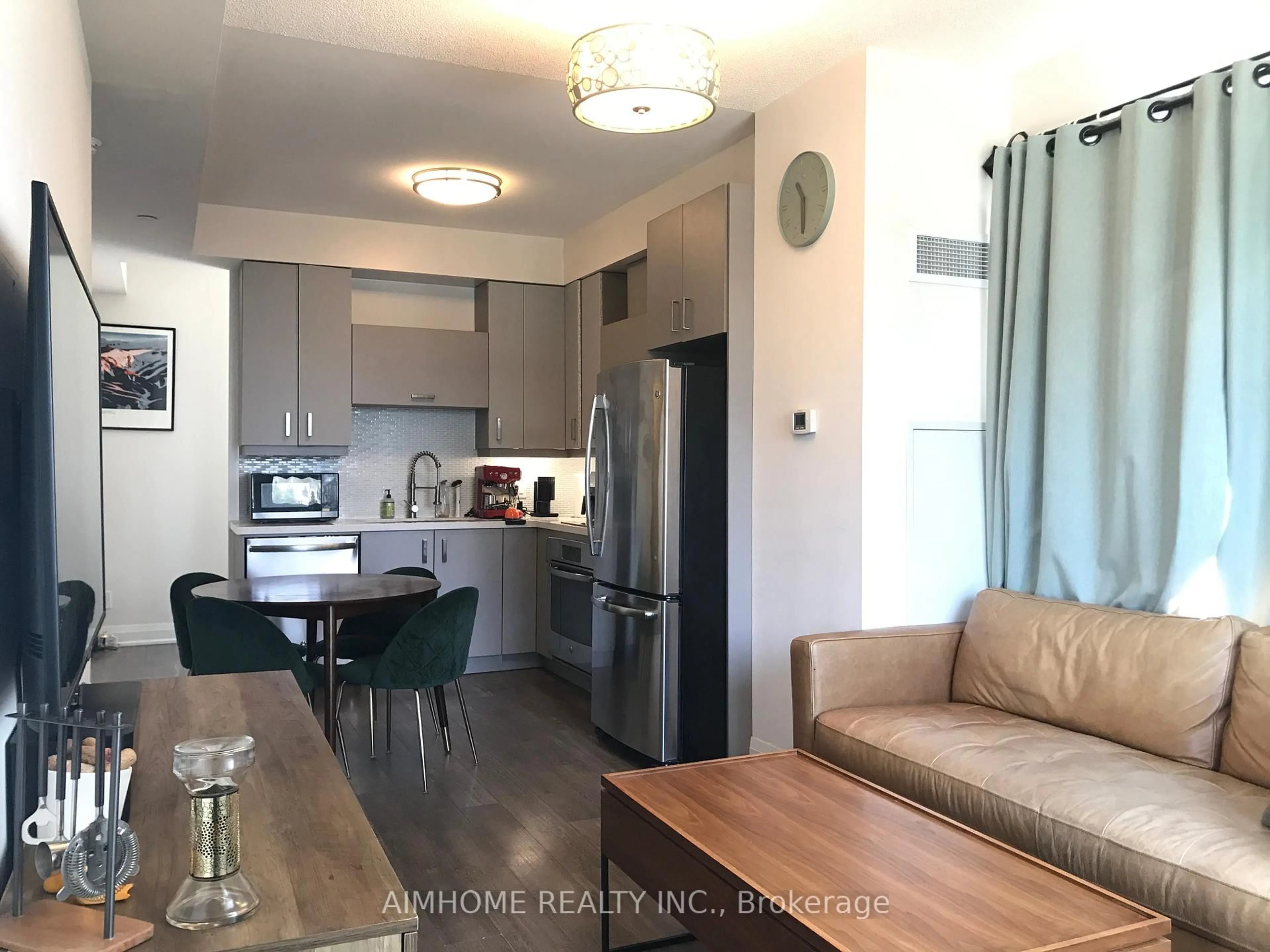 Open concept kitchen, wood/laminate floor for 28 Uptown Dr #605, Markham Ontario L3R 5M8