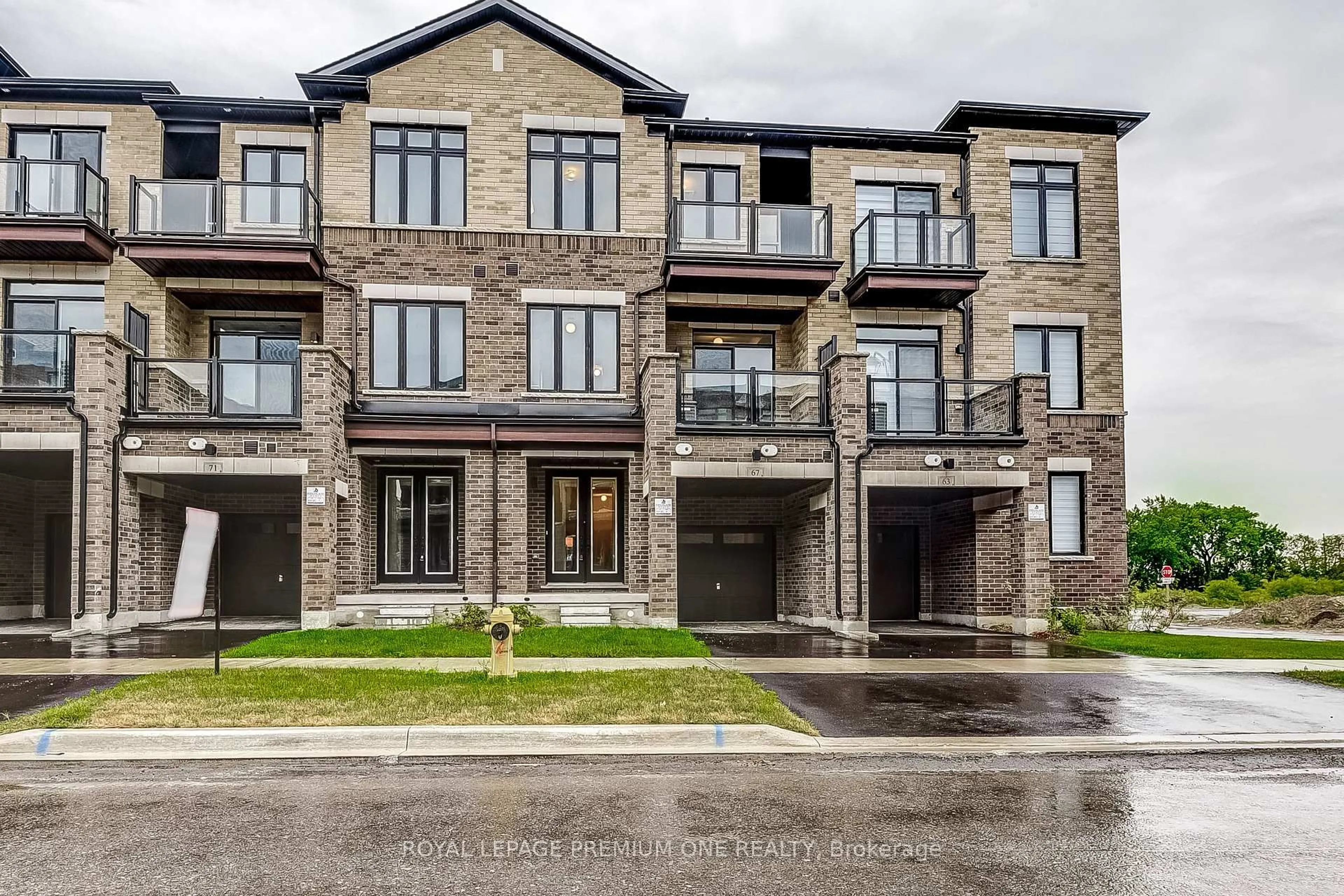 Home with brick exterior material, street for 67 TENNANT Circ, Vaughan Ontario L4H 5L5