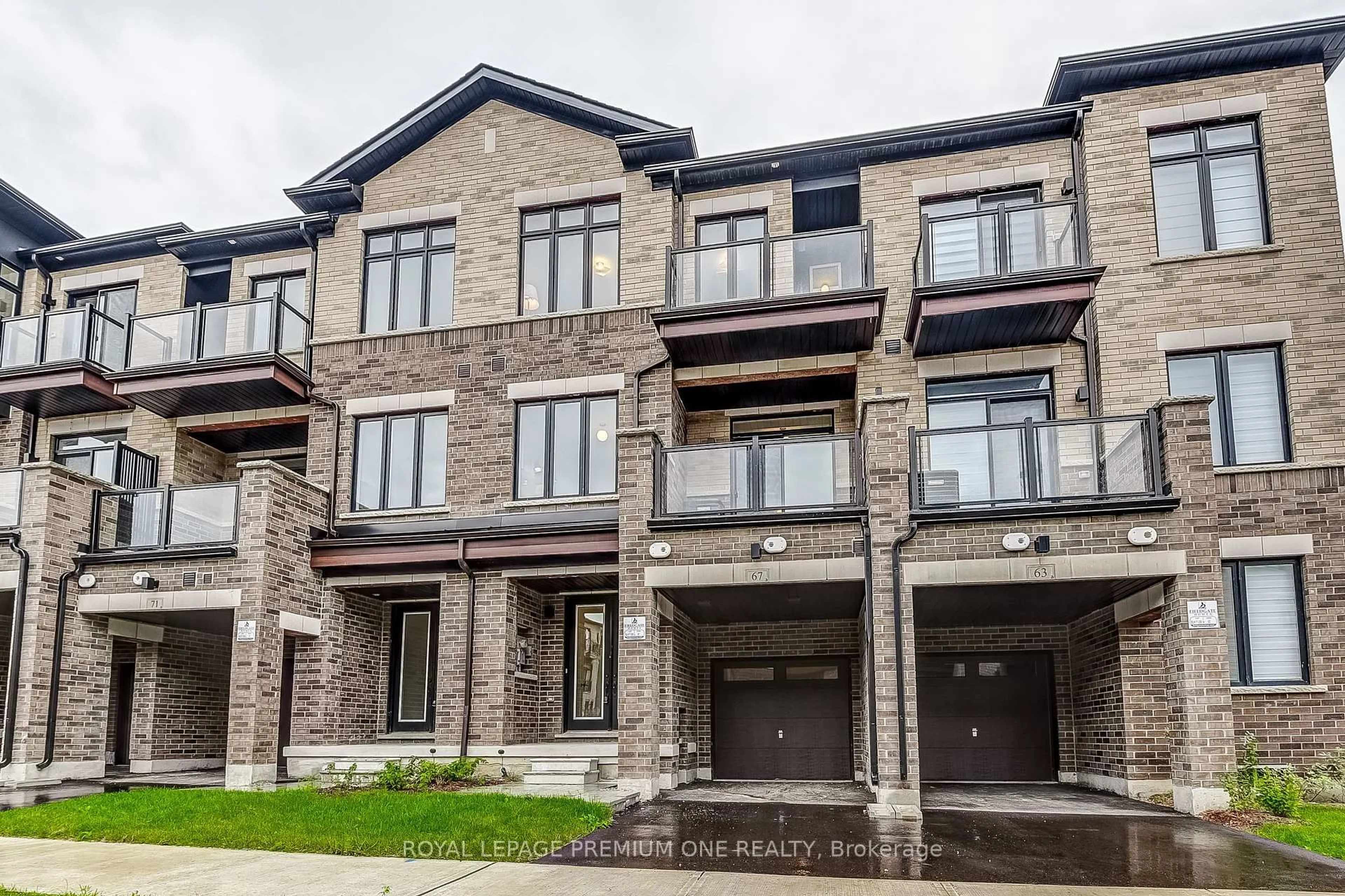 Home with brick exterior material, street for 67 TENNANT Circ, Vaughan Ontario L4H 5L5