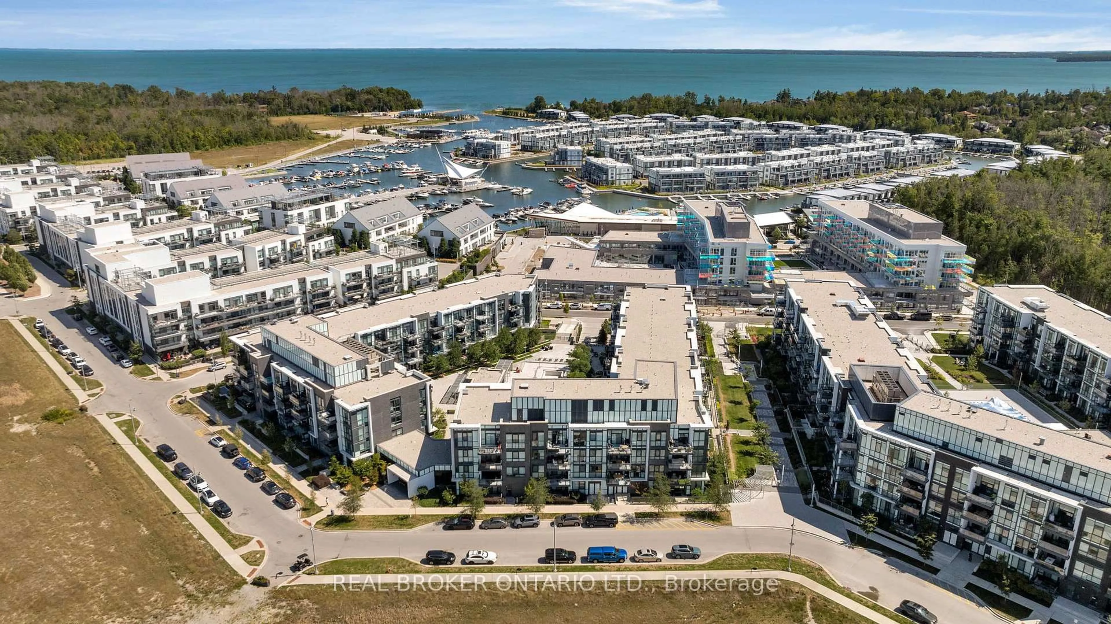 A pic from outside/outdoor area/front of a property/back of a property/a pic from drone, water/lake/river/ocean view for 375 Sea Ray Ave #G34, Innisfil Ontario L9S 0N9