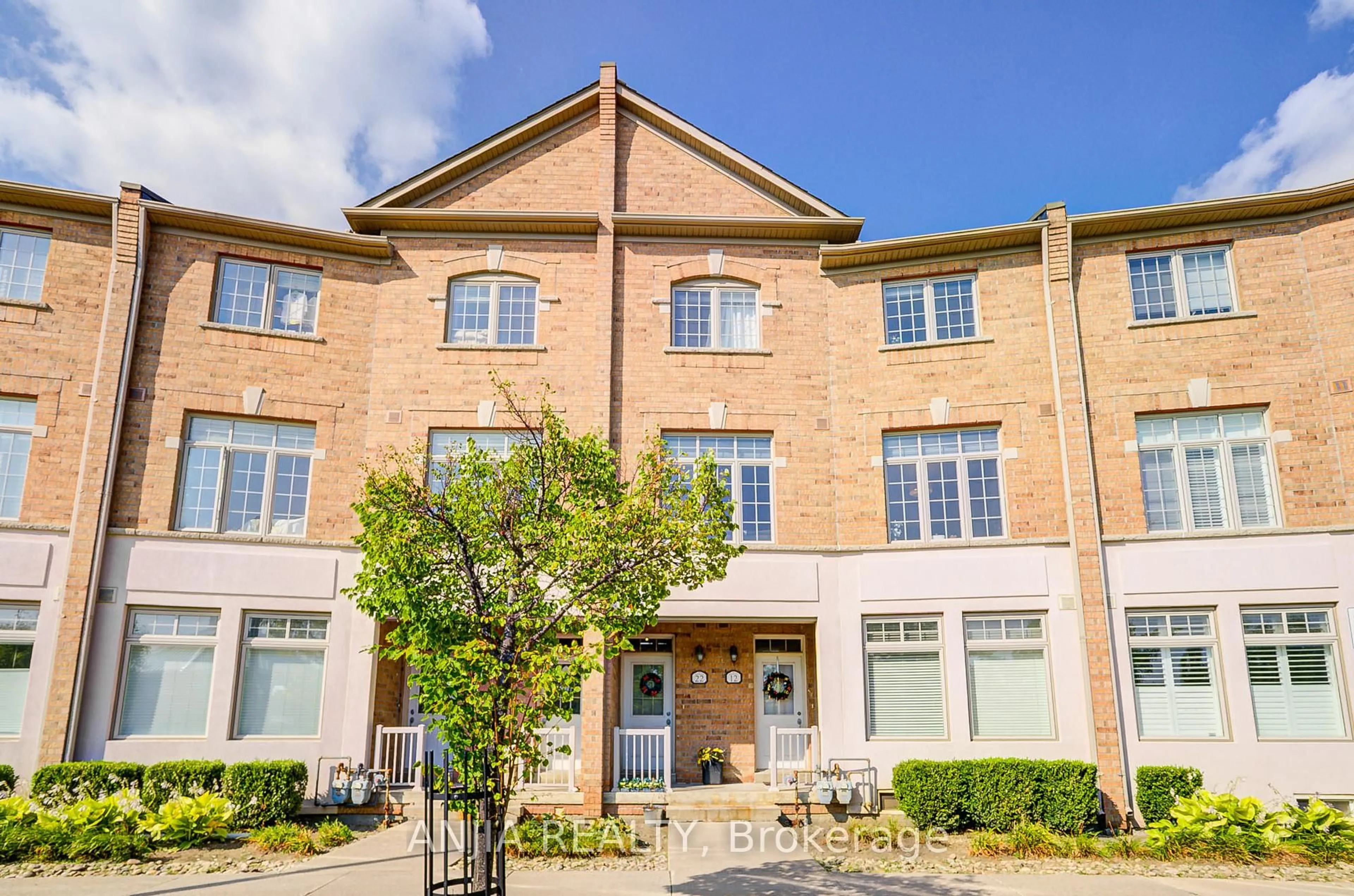 Home with brick exterior material, building for 30 Greensborough Village Circ #22, Markham Ontario L6E 1Z1