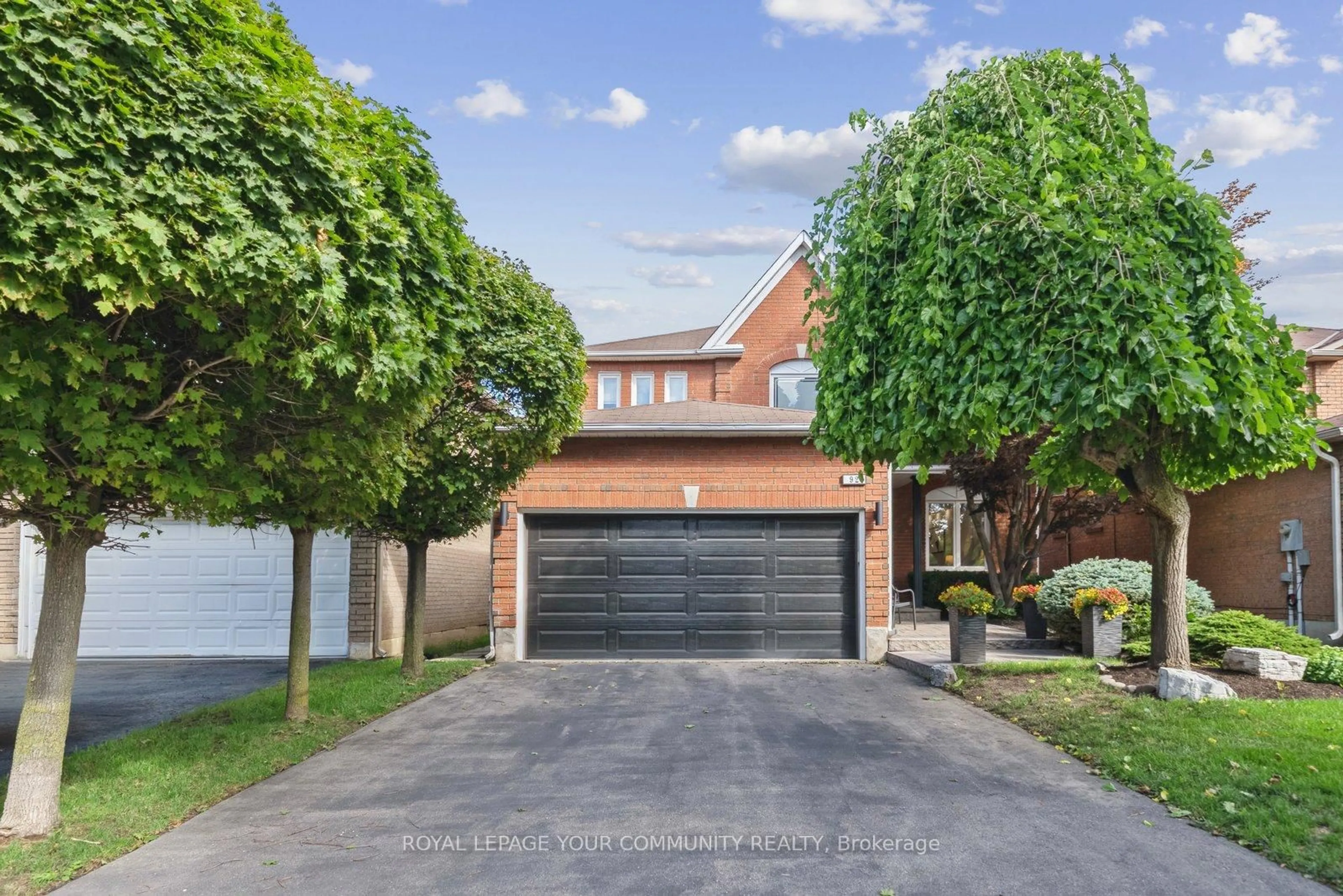 Home with brick exterior material, street for 92 Mulholland Dr, Vaughan Ontario L4J 7T8