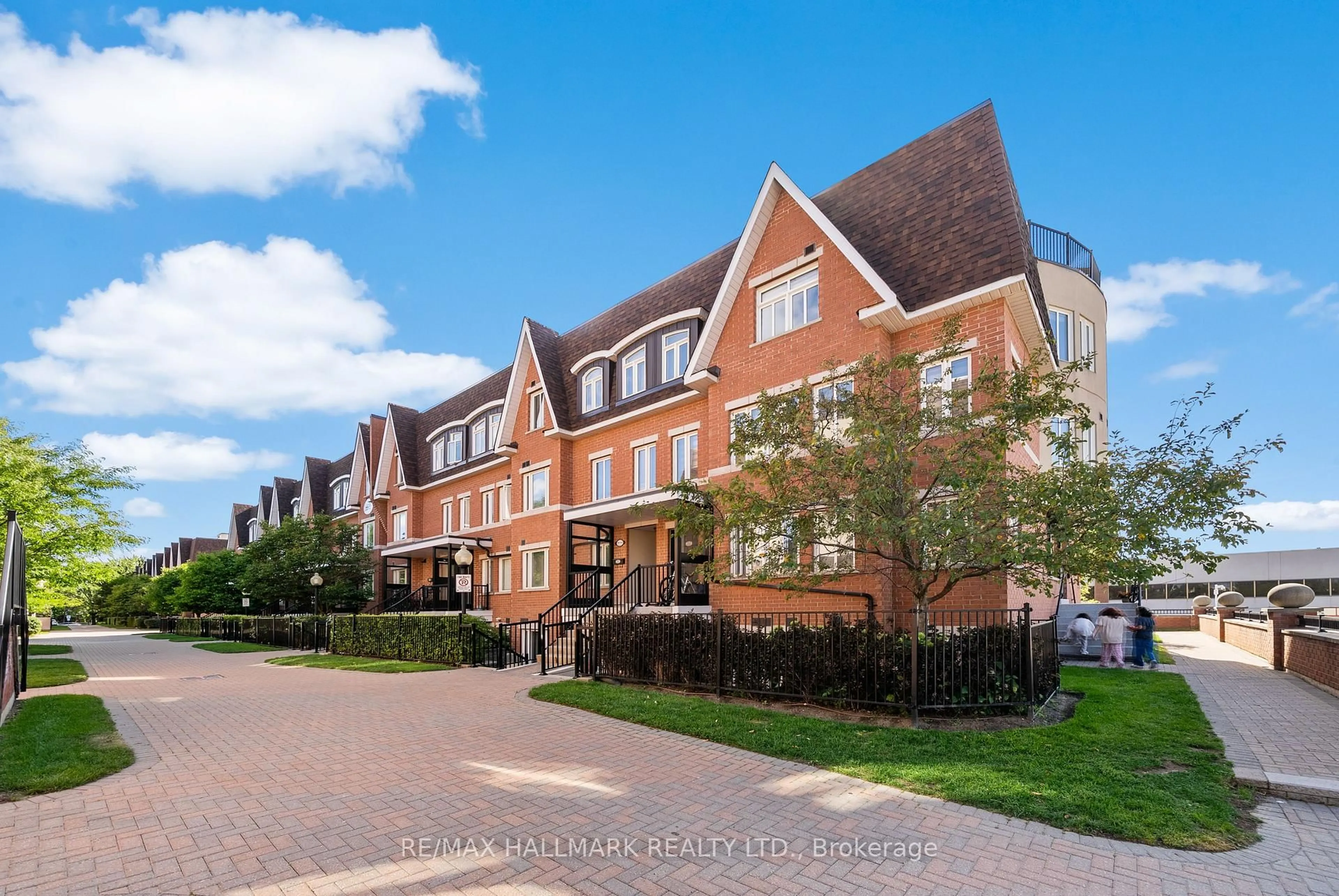 A pic from outside/outdoor area/front of a property/back of a property/a pic from drone, street for 308 John St #213, Markham Ontario L3T 0A7