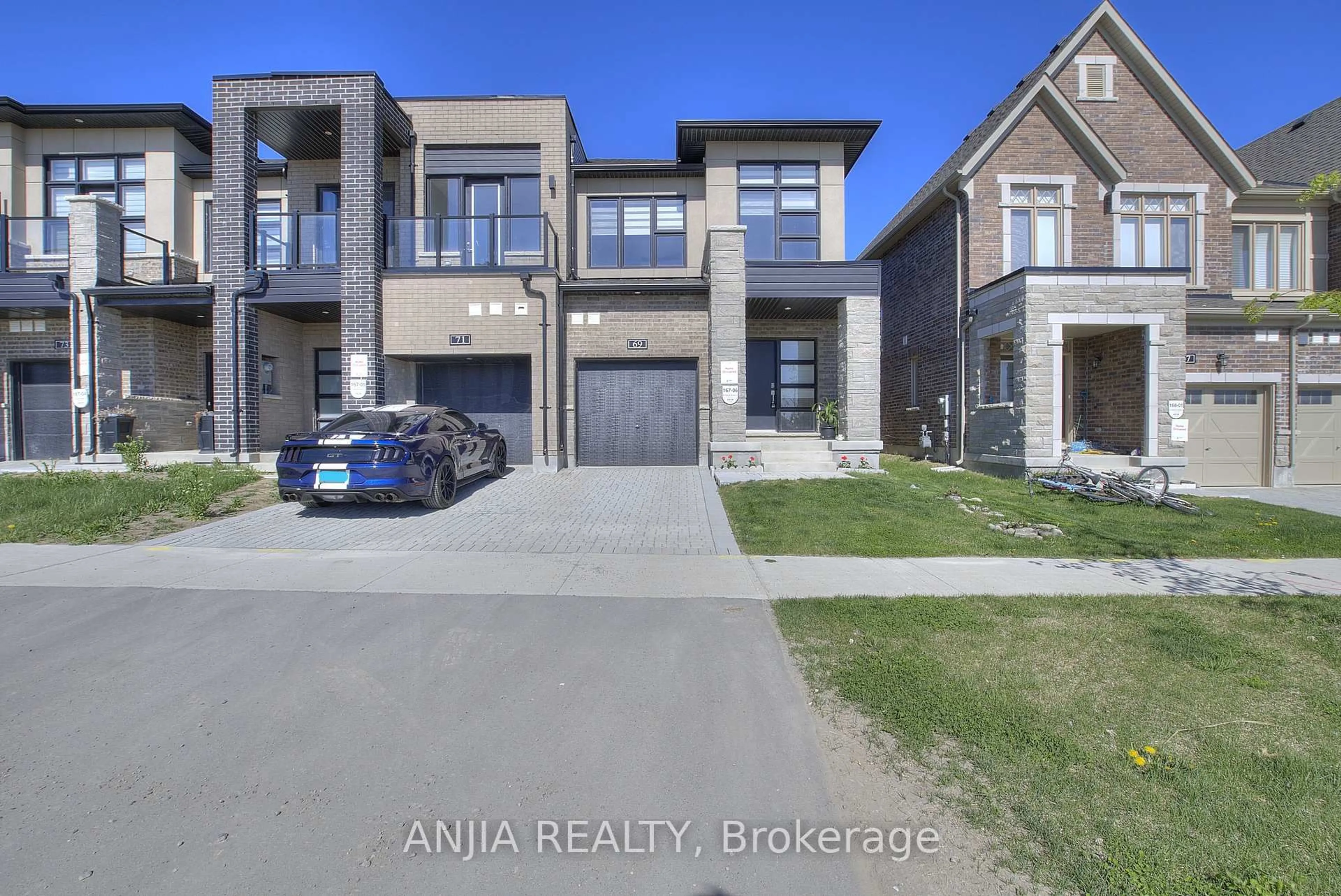 A pic from outside/outdoor area/front of a property/back of a property/a pic from drone, street for 69 Freeman Williams St, Markham Ontario L6C 3K4