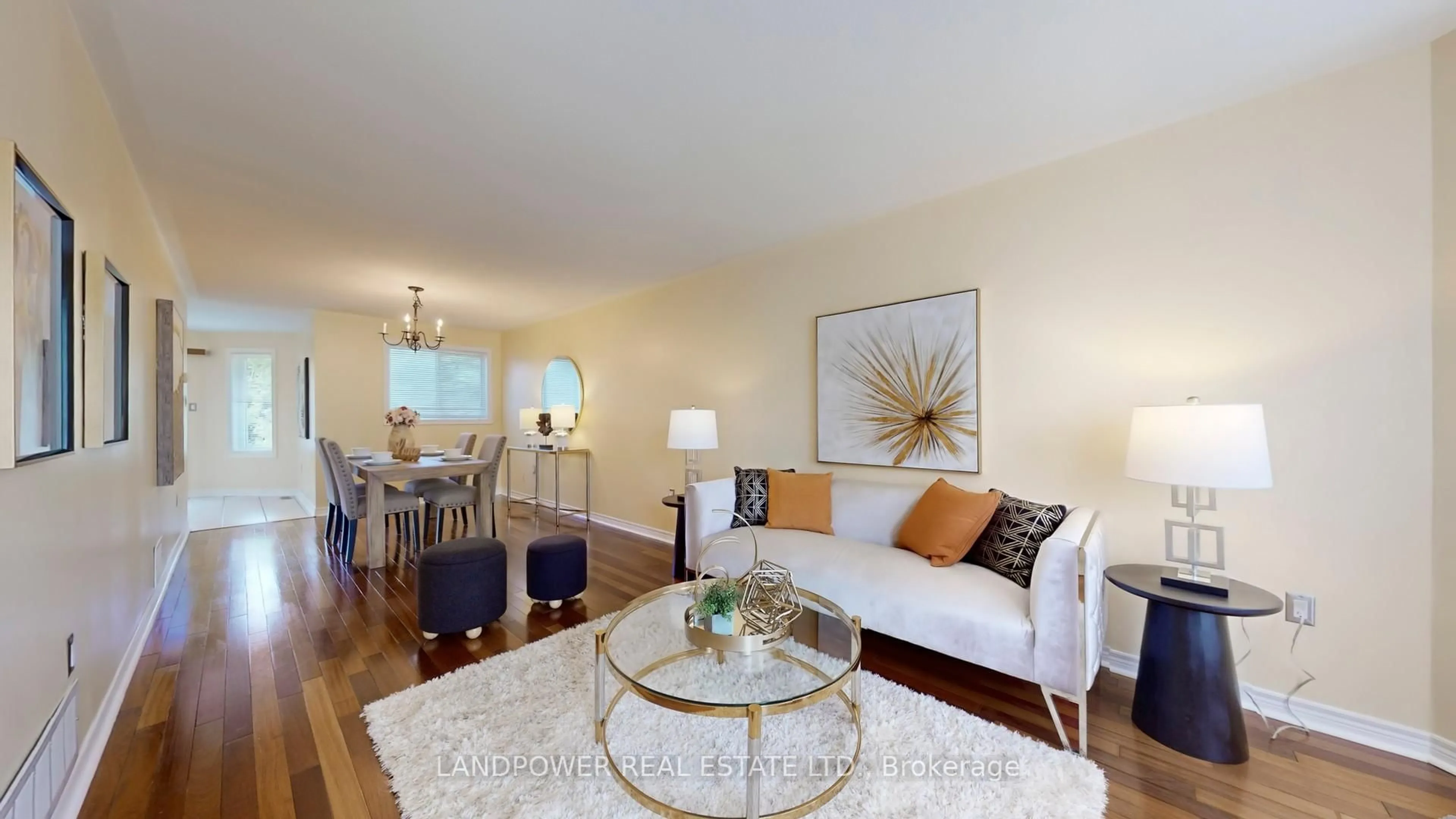 Living room with furniture, wood/laminate floor for 36 Amberview Dr, Georgina Ontario L4P 3X8