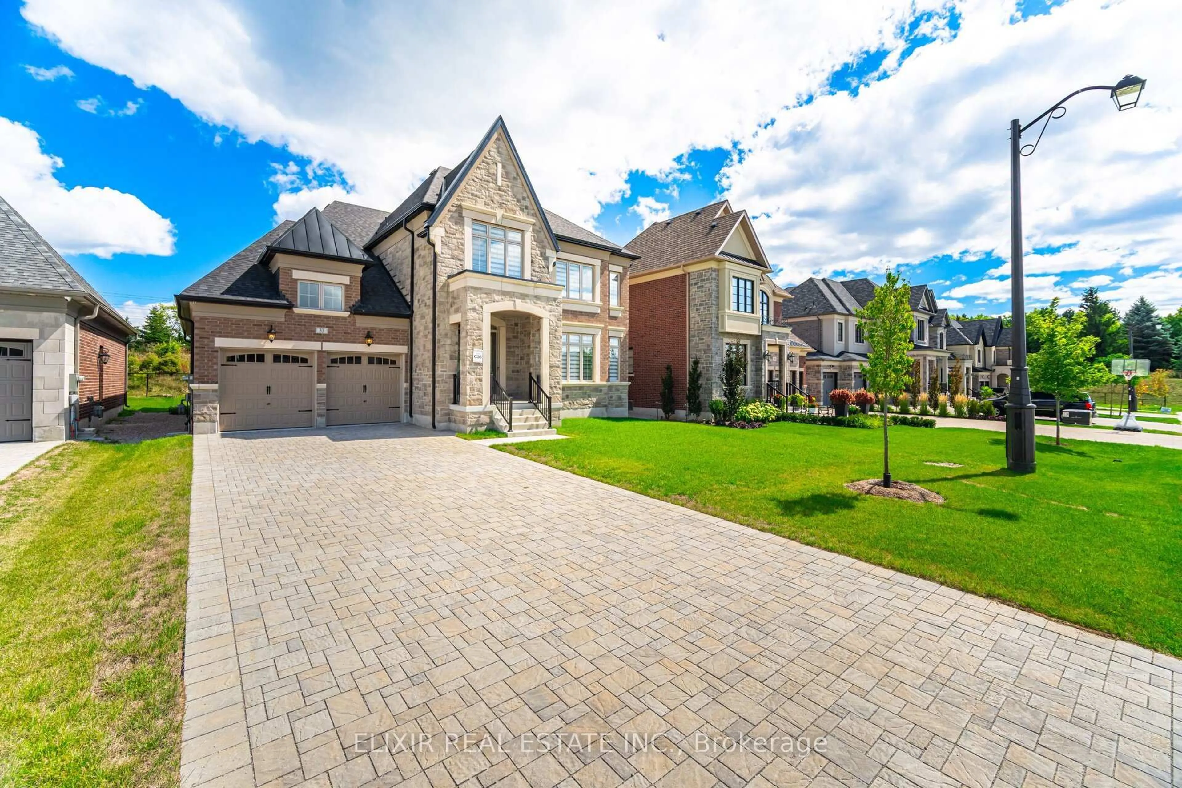 Home with brick exterior material, street for 33 Sculpture Garden Lane, Vaughan Ontario L4H 4P1