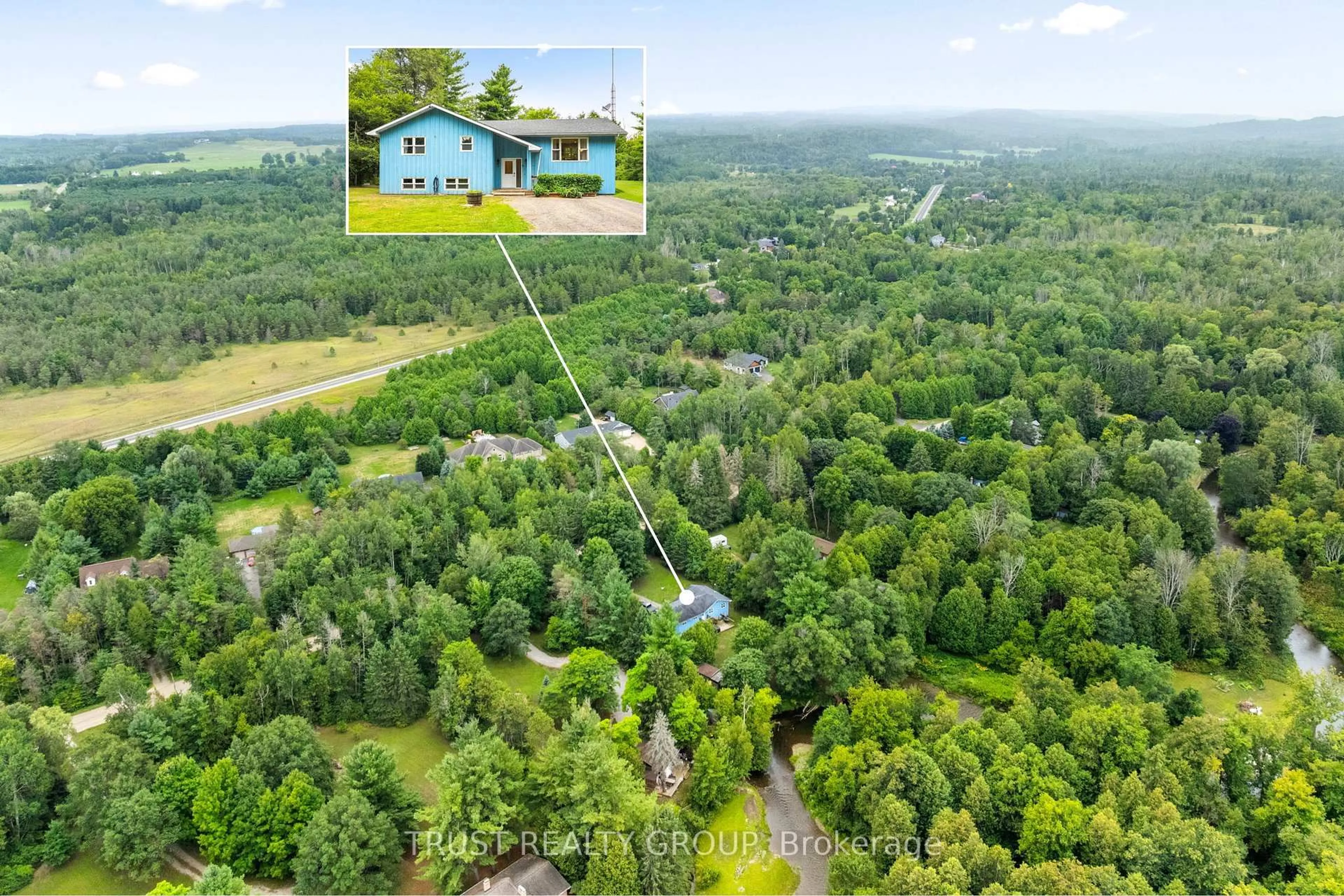A pic from outside/outdoor area/front of a property/back of a property/a pic from drone, forest/trees view for 9048 River Rd, Adjala-Tosorontio Ontario L0N 1P0