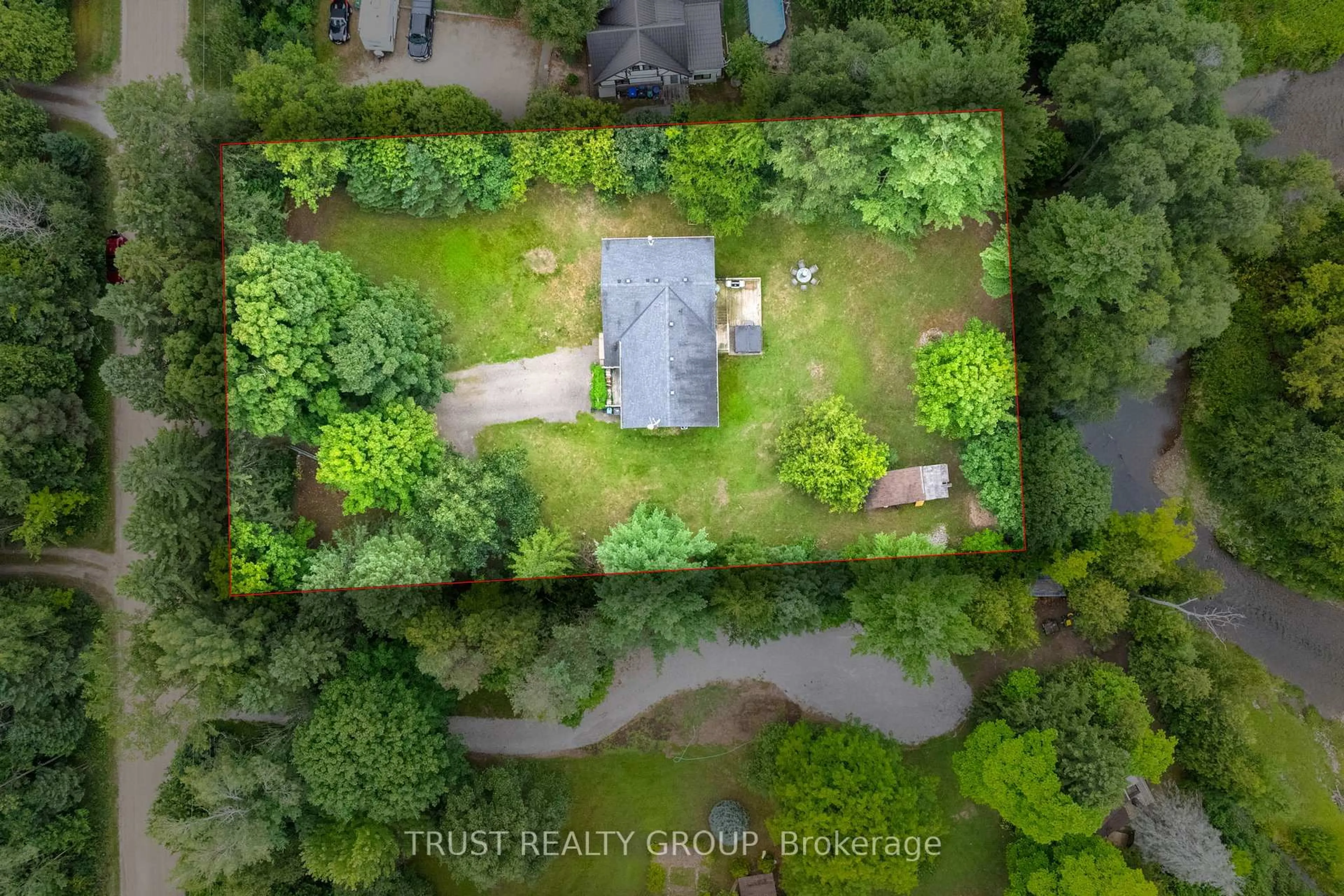 A pic from outside/outdoor area/front of a property/back of a property/a pic from drone, unknown for 9048 River Rd, Adjala-Tosorontio Ontario L0N 1P0