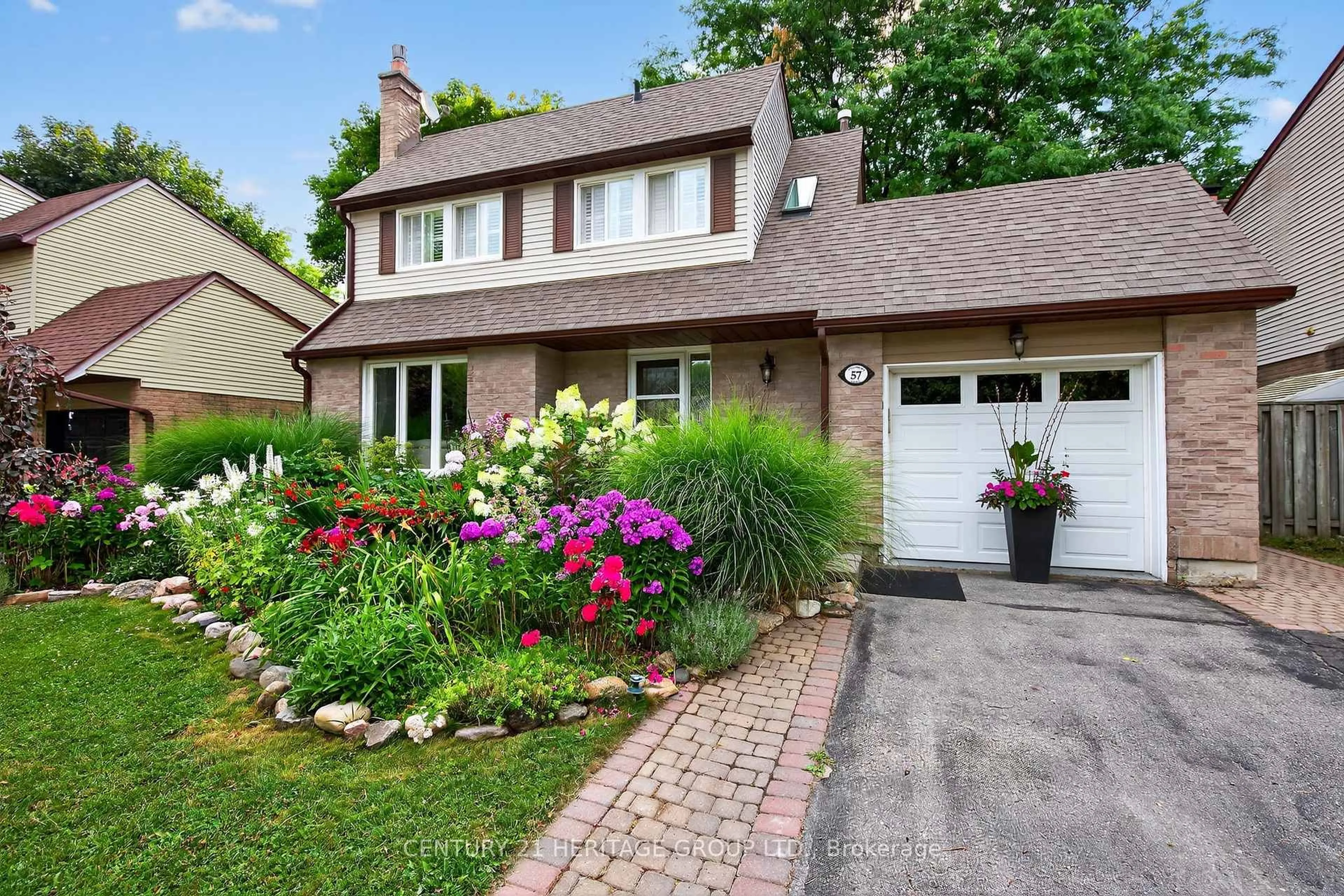 Home with brick exterior material, street for 57 Stoddart Dr, Aurora Ontario L4G 2G4
