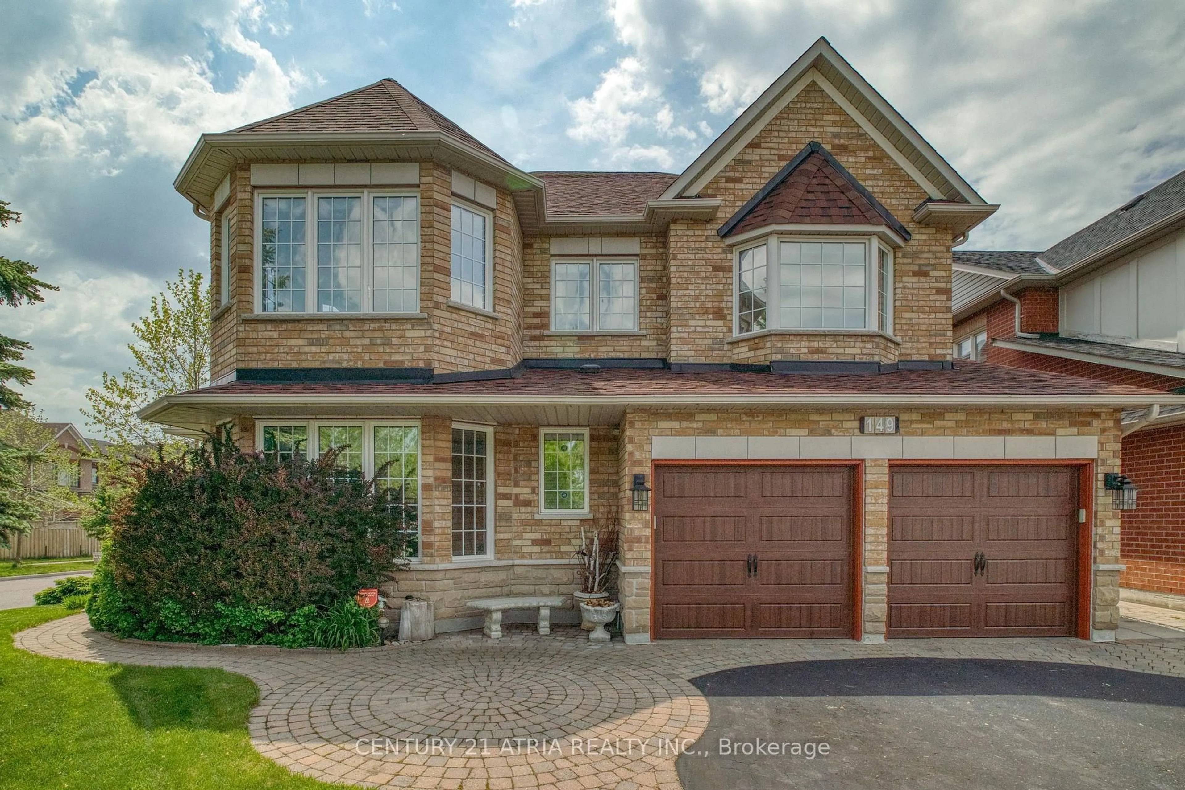 Home with brick exterior material, street for 149 Russell Jarvis Dr, Markham Ontario L3S 4L1