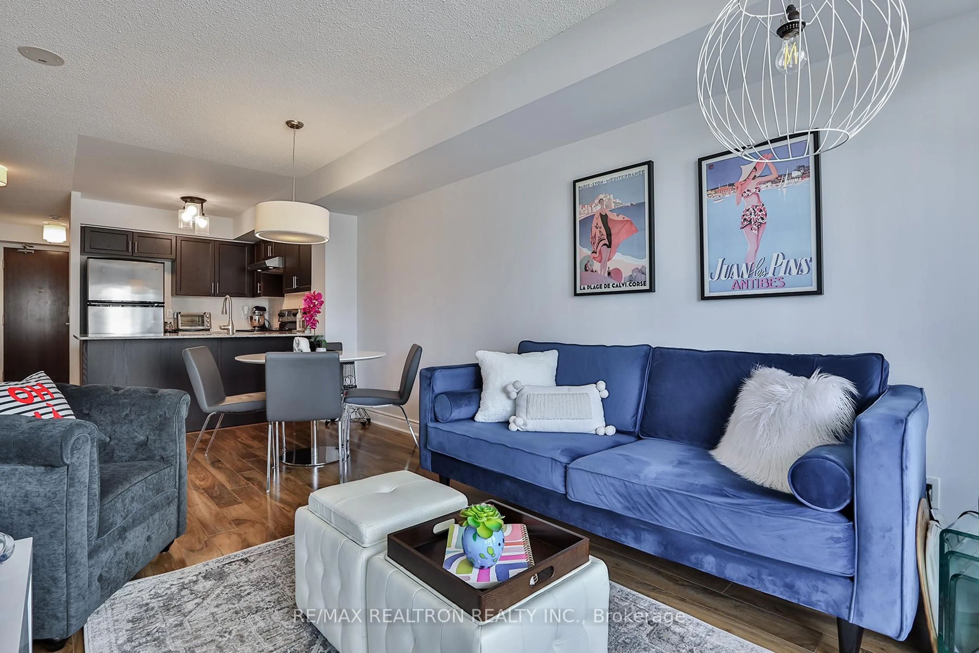Living room with furniture, wood/laminate floor for 7 North Park Rd #404, Vaughan Ontario L4J 0C9