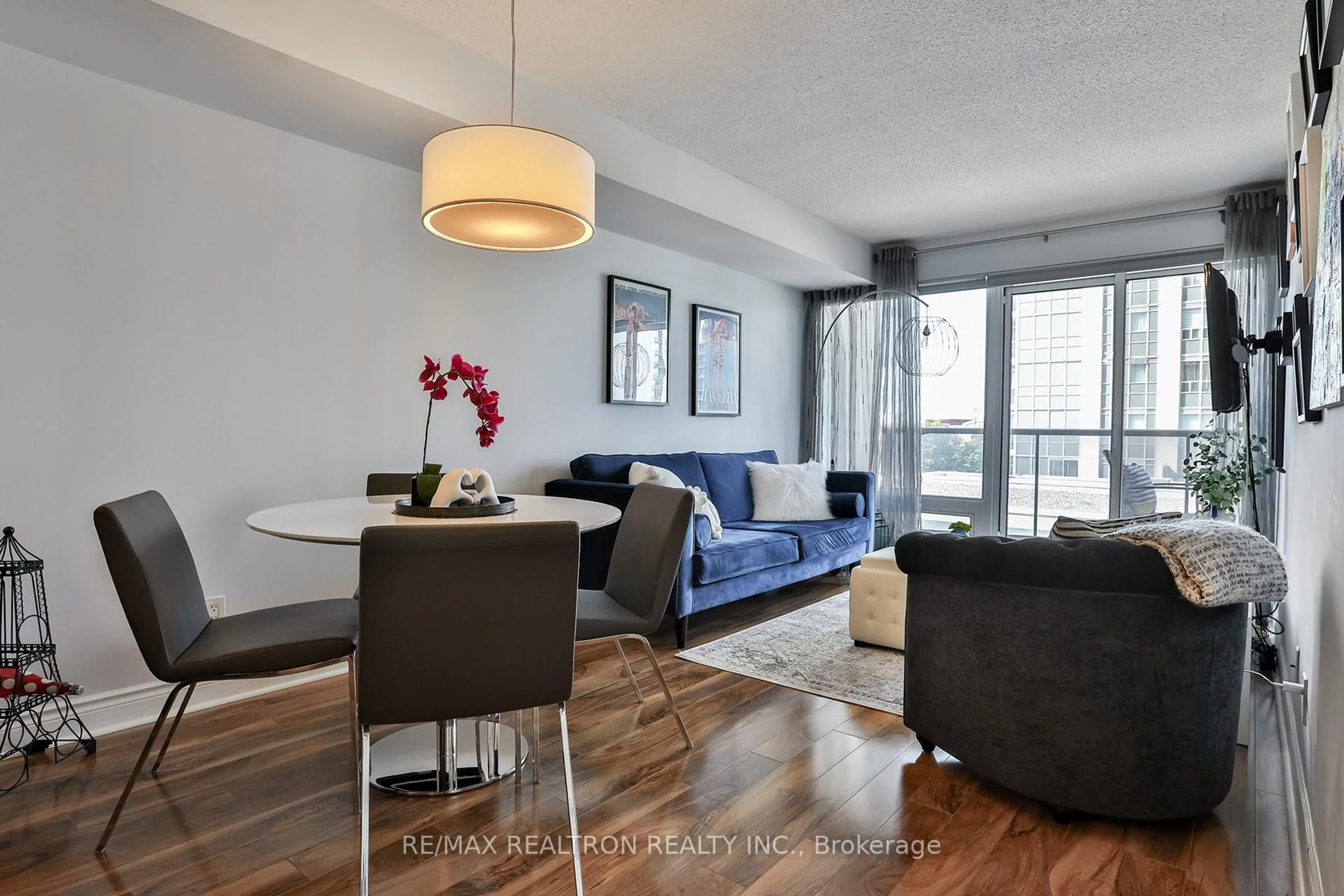 Living room with furniture, wood/laminate floor for 7 North Park Rd #404, Vaughan Ontario L4J 0C9