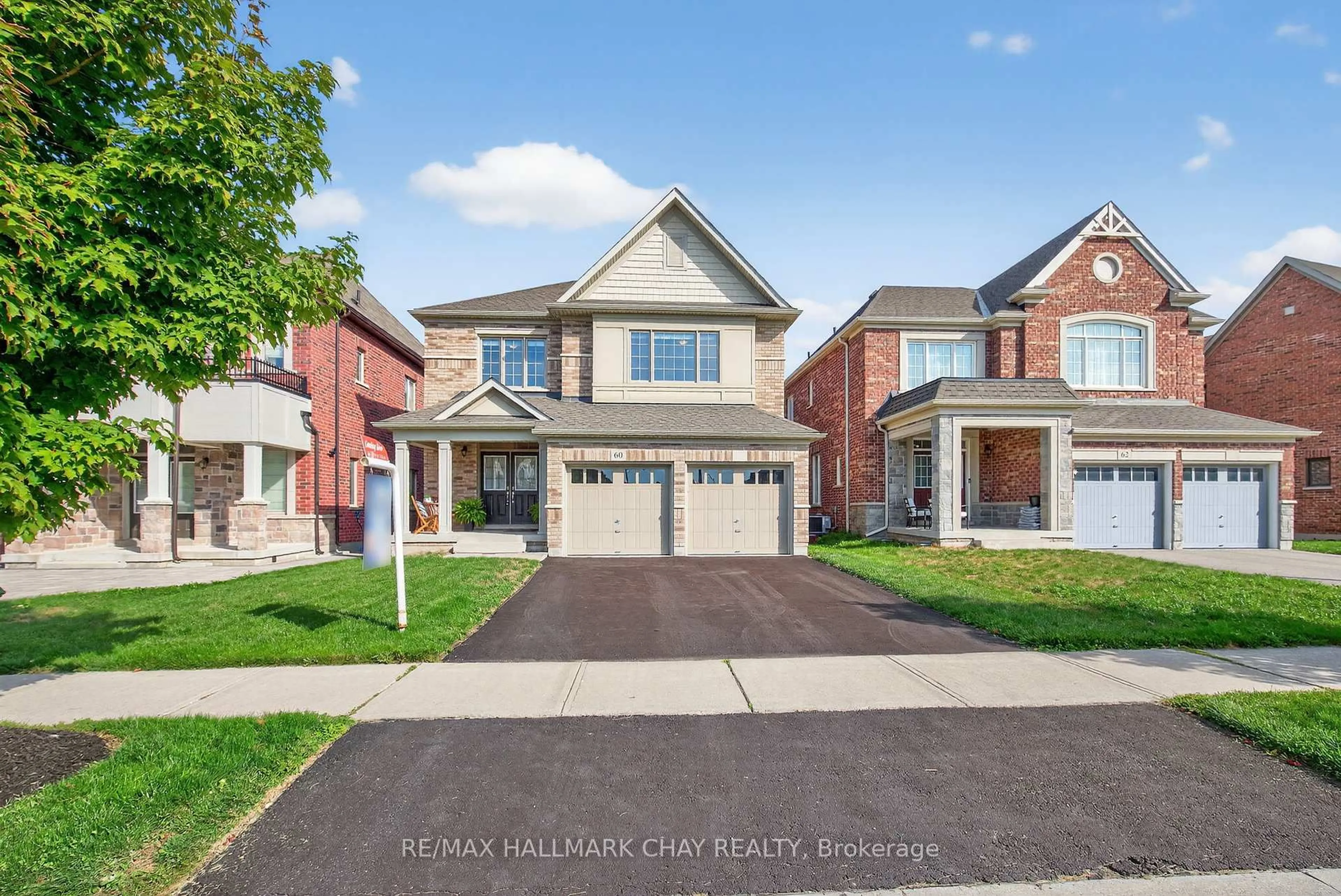 Home with brick exterior material, street for 60 Briarfield Ave, East Gwillimbury Ontario L9N 0P4