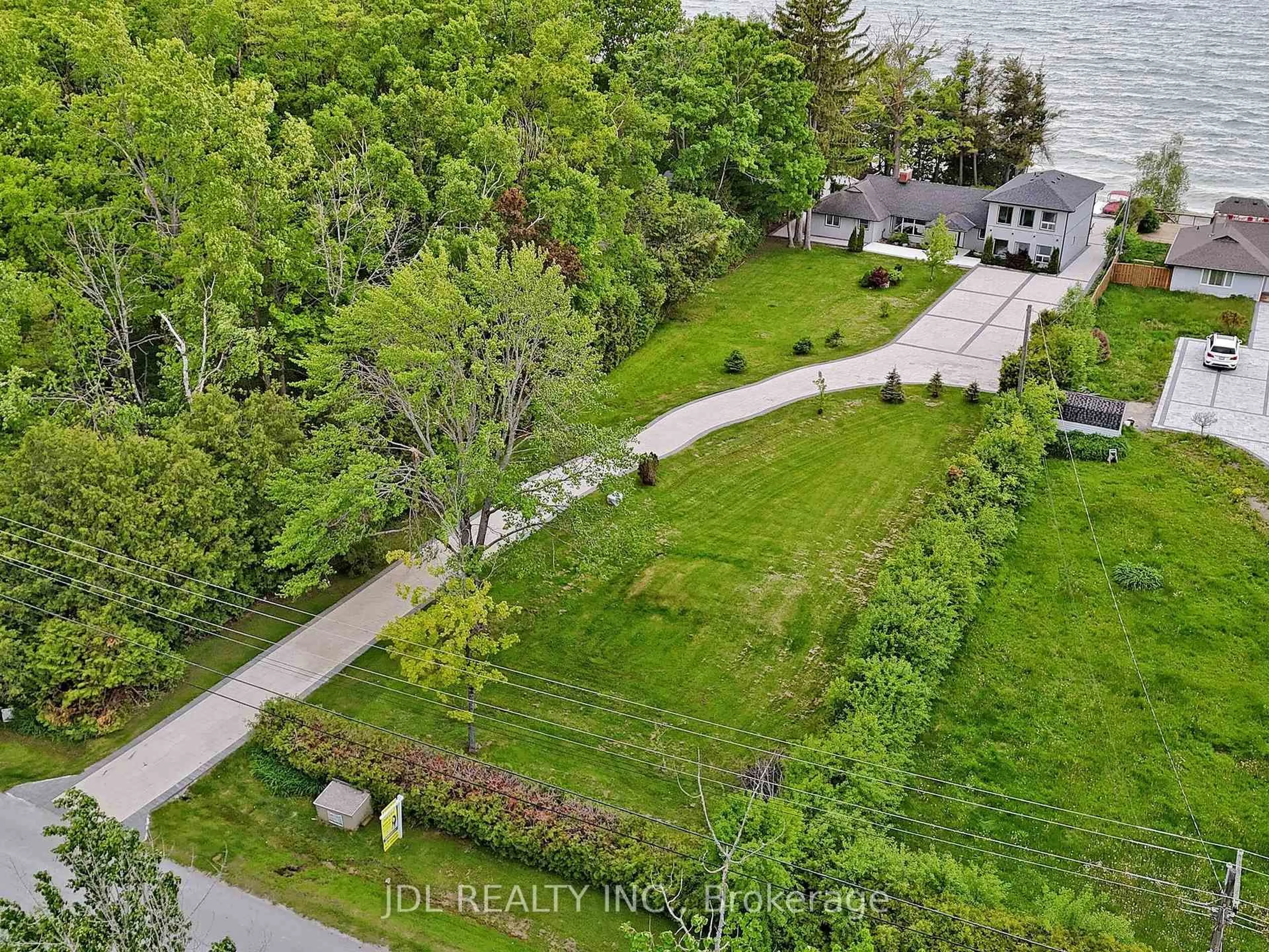 A pic from outside/outdoor area/front of a property/back of a property/a pic from drone, water/lake/river/ocean view for 25220 Maple Beach Rd, Brock Ontario L0K 1A0