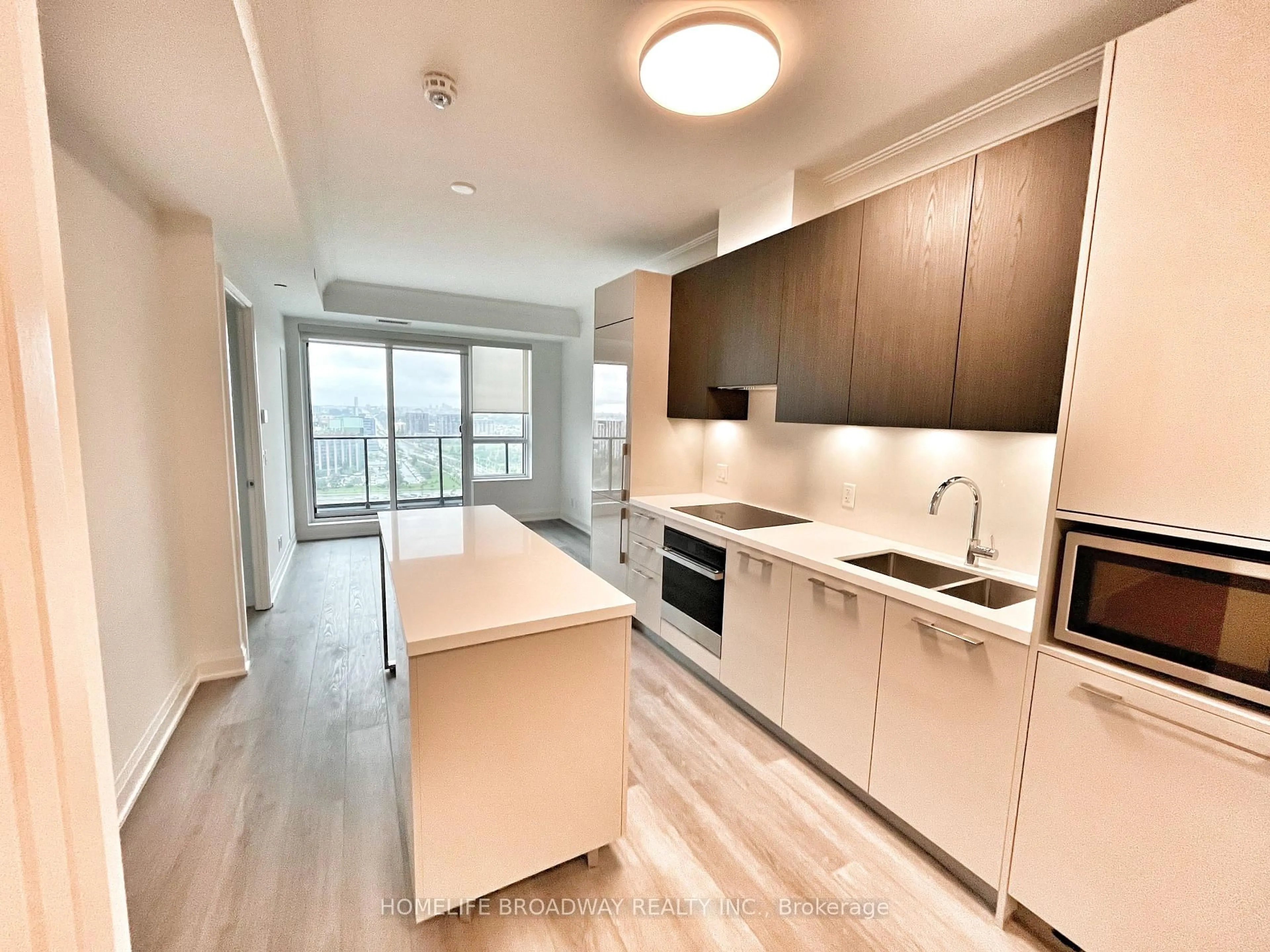 Open concept kitchen, wood/laminate floor for 18 Water Walk Dr #2607, Markham Ontario L3R 6L5