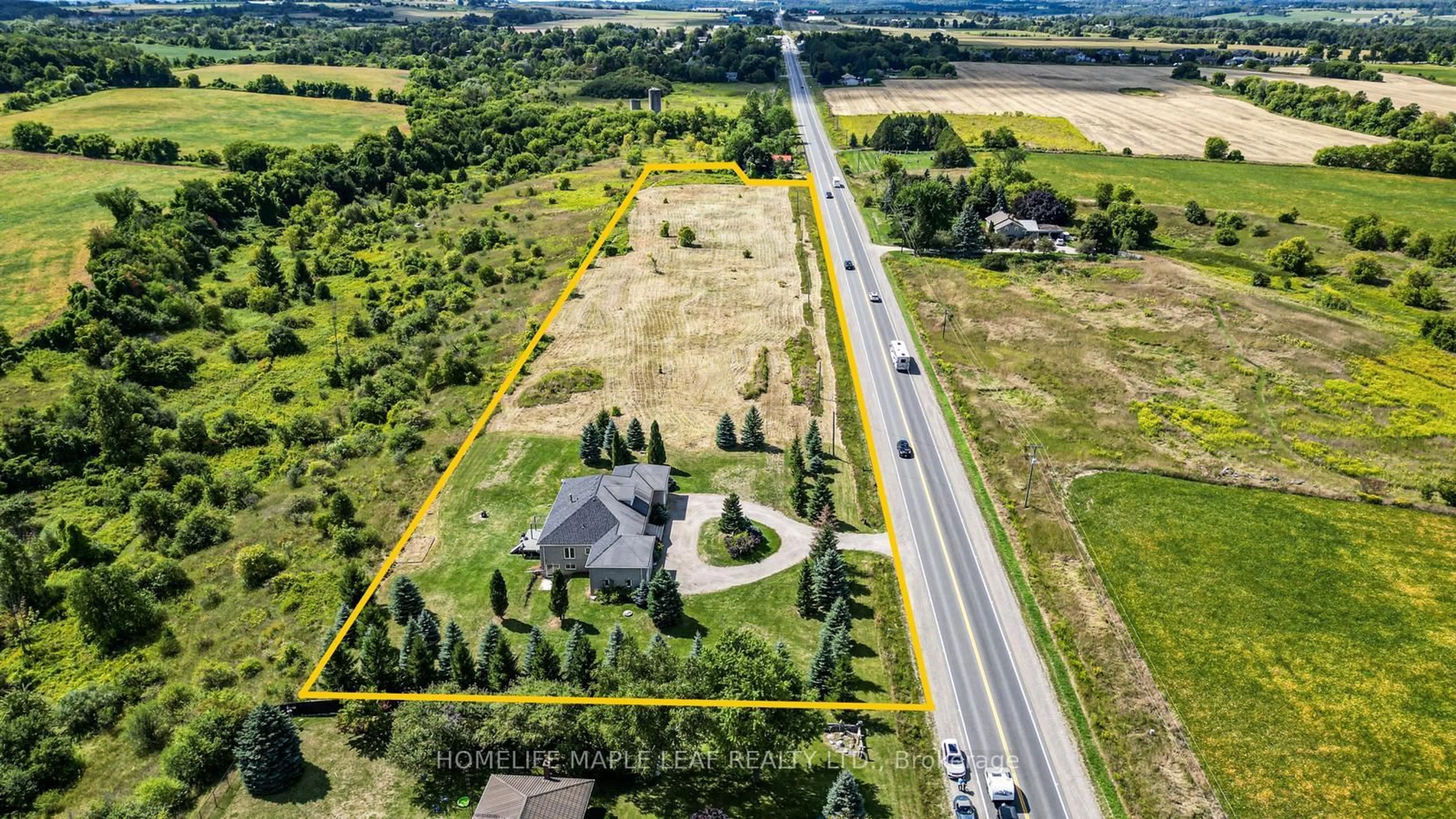 A pic from outside/outdoor area/front of a property/back of a property/a pic from drone, street for 9035 Highway 89, Adjala-Tosorontio Ontario L9R 1V1