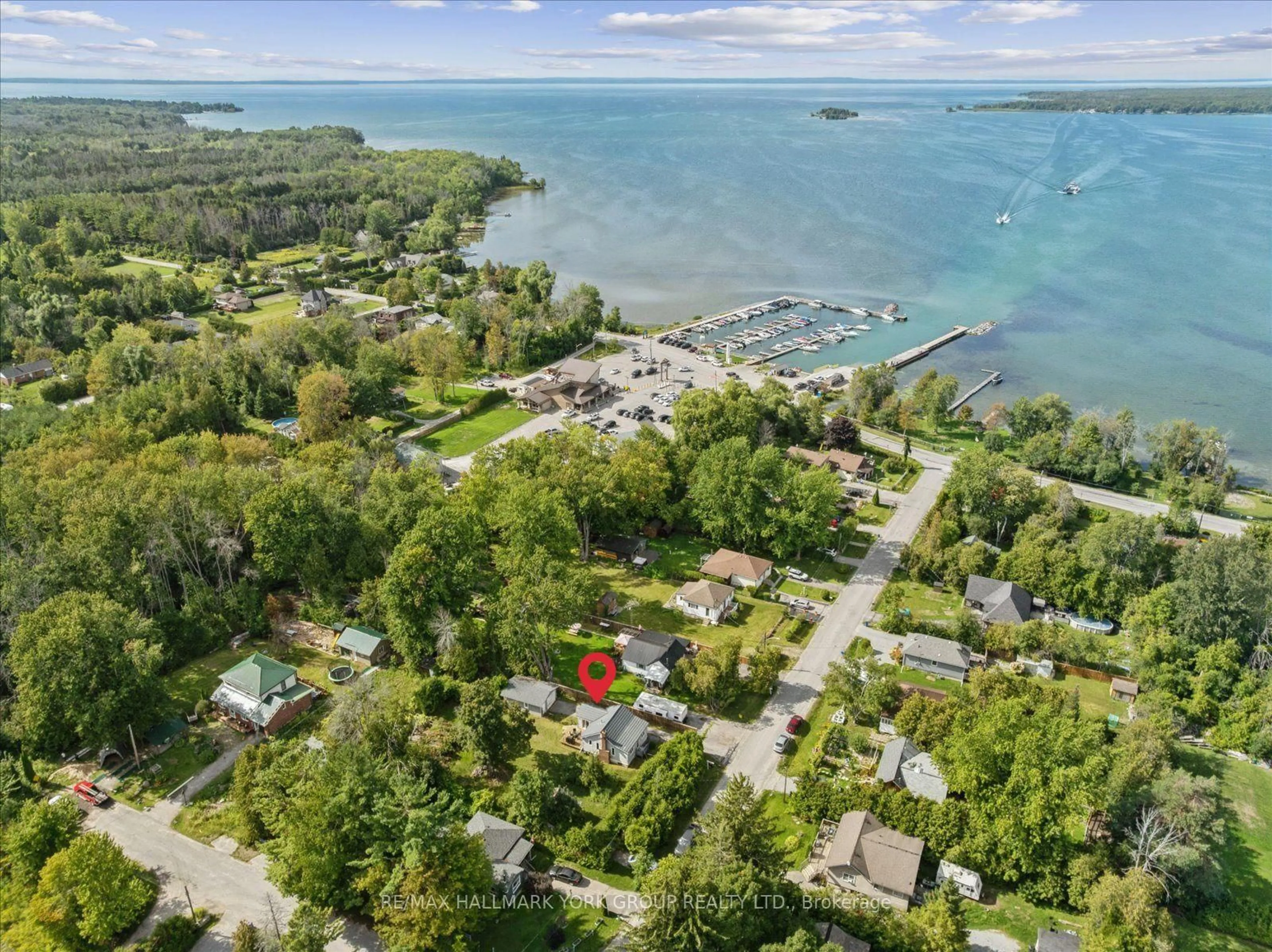 A pic from outside/outdoor area/front of a property/back of a property/a pic from drone, water/lake/river/ocean view for 6 Della St, Georgina Ontario L0E 1R0
