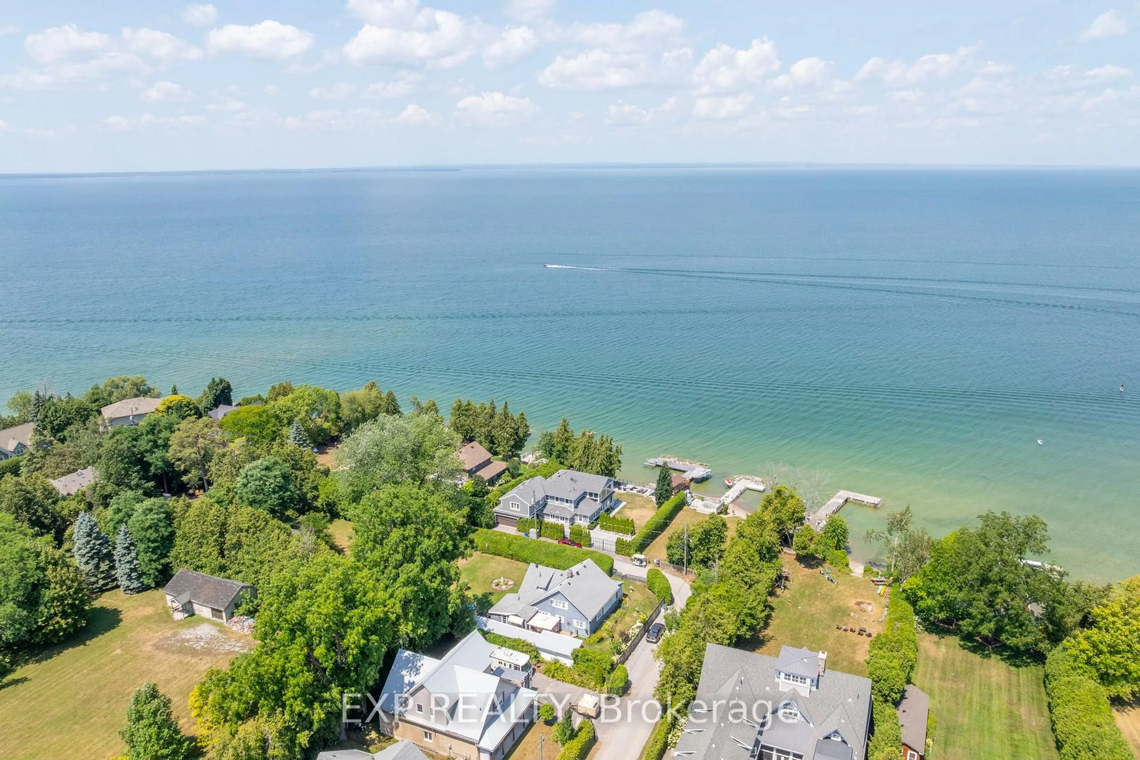 A pic from outside/outdoor area/front of a property/back of a property/a pic from drone, water/lake/river/ocean view for 45 Westwind Circ, Georgina Ontario L0E 1S0