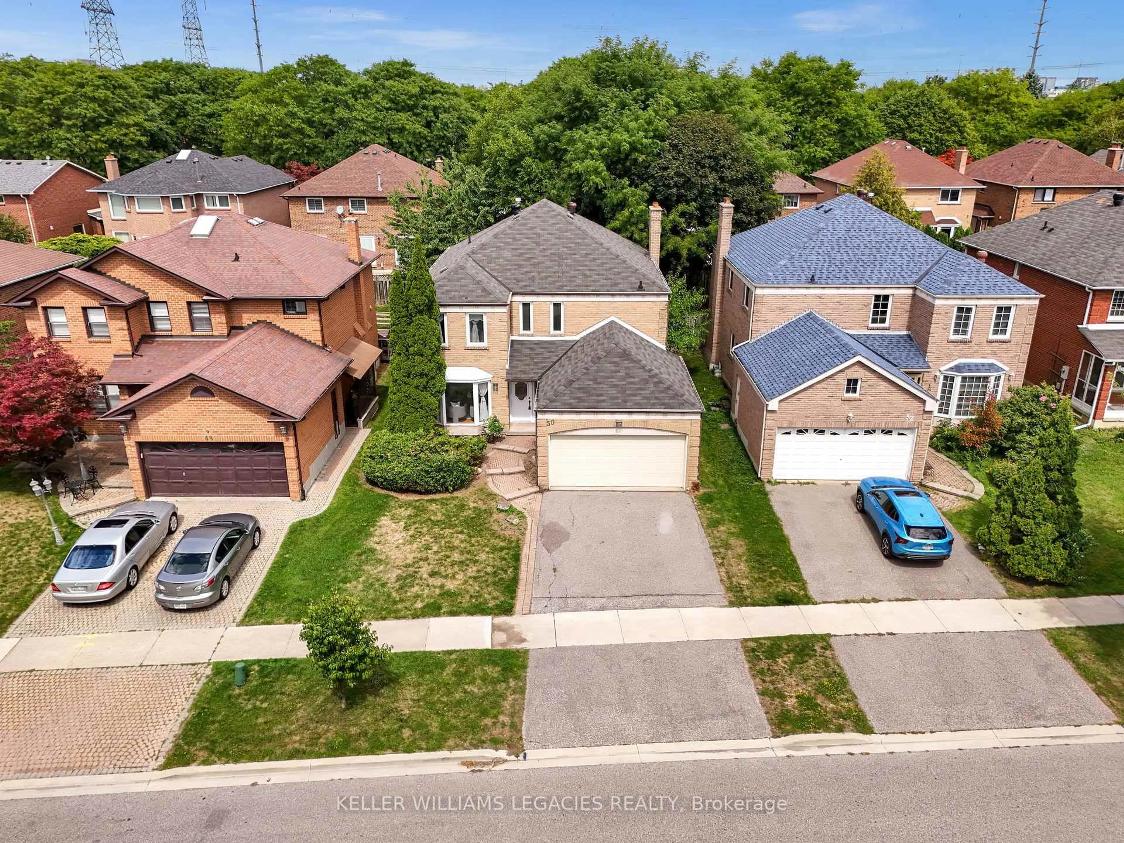 A pic from outside/outdoor area/front of a property/back of a property/a pic from drone, street for 50 Summerdale Dr, Markham Ontario L3T 6W5