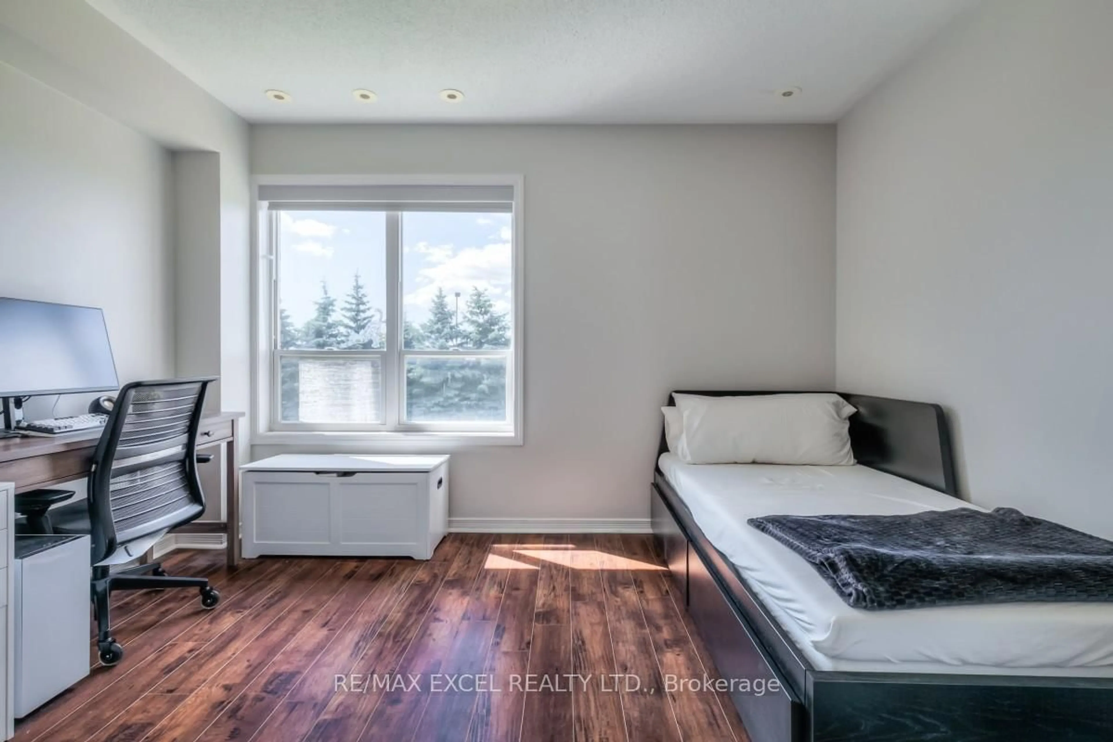 Bedroom with bed, wood/laminate floor for 105 Faithful Way, Markham Ontario L3R 1A1