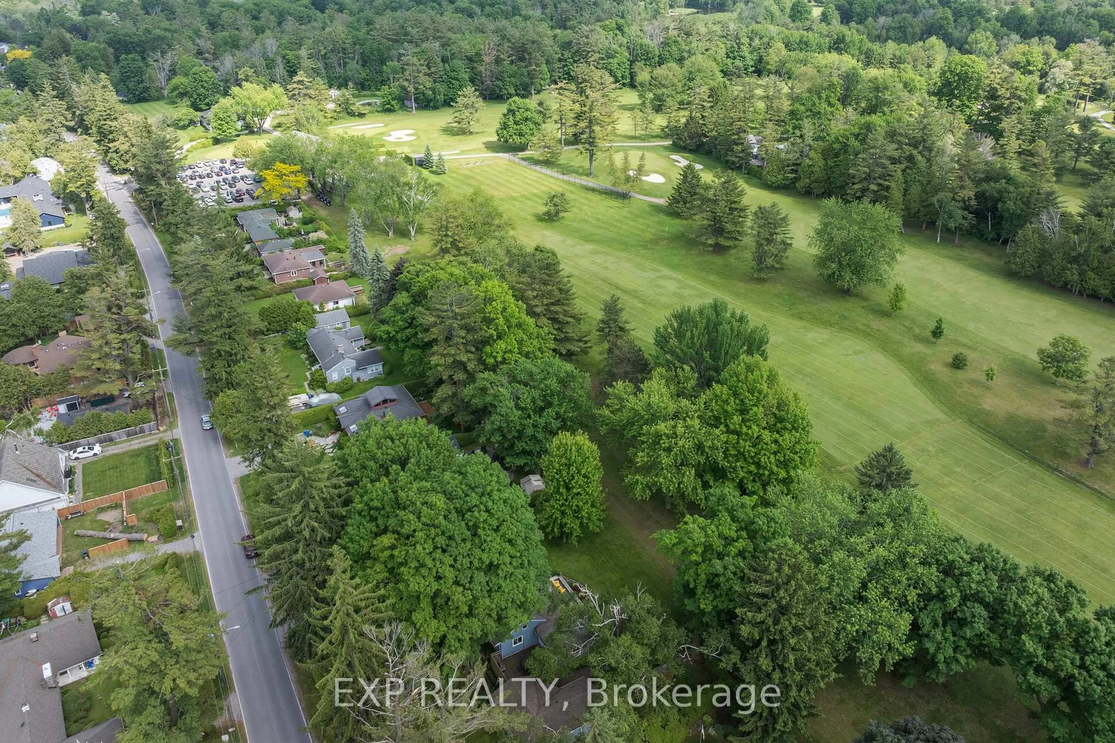 A pic from outside/outdoor area/front of a property/back of a property/a pic from drone, forest/trees view for 101 Hedge Rd, Georgina Ontario L0E 1L0