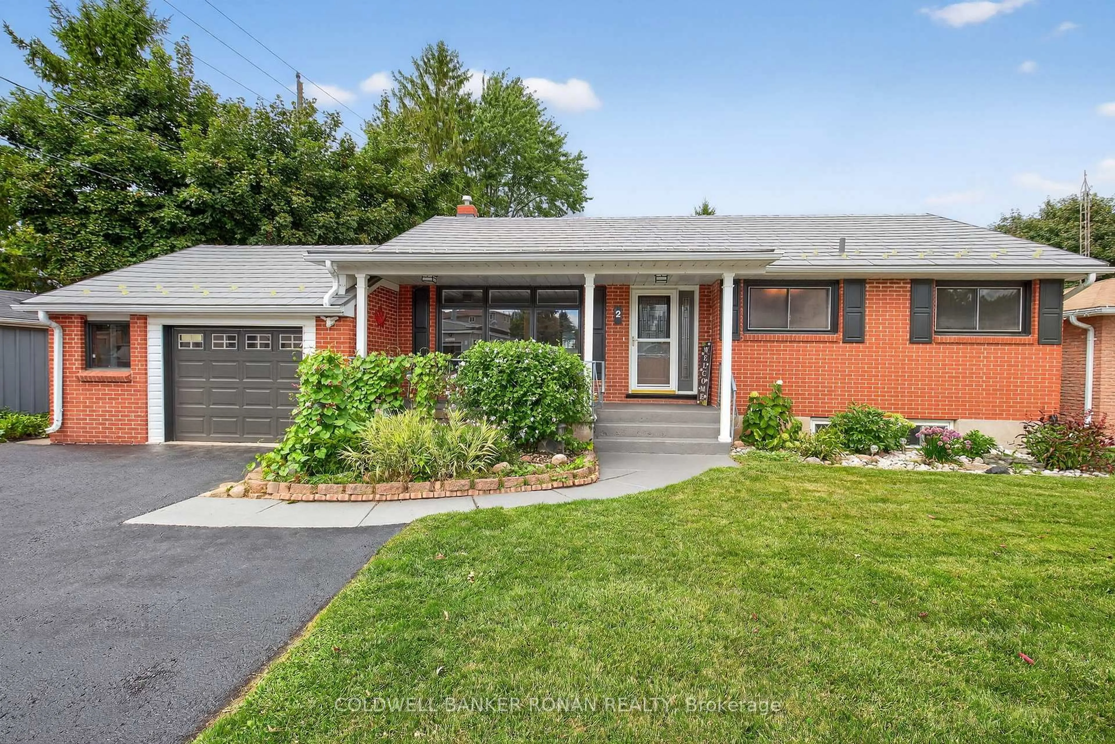 Home with brick exterior material, street for 2 Lionel Stone Ave, New Tecumseth Ontario L0G 1W0