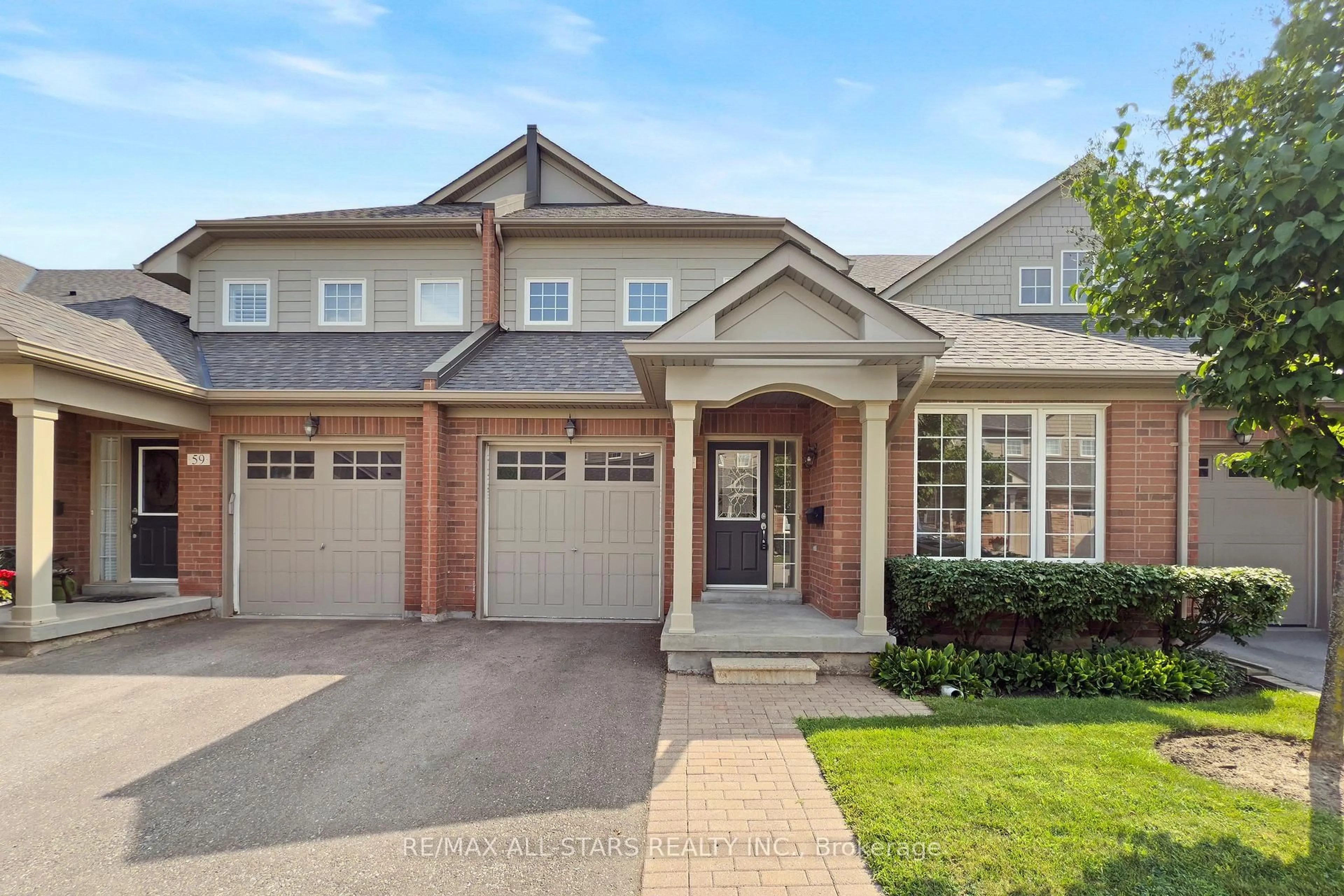 Home with brick exterior material, street for 57 Oasis Way, Markham Ontario L6E 0B6