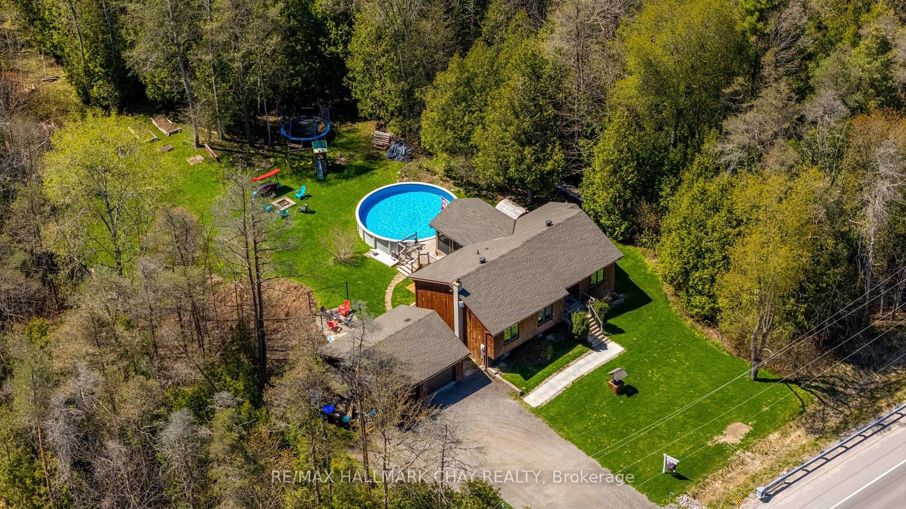 A pic from outside/outdoor area/front of a property/back of a property/a pic from drone, water/lake/river/ocean view for 7912 County Road 56 Rd, Essa Ontario L0M 1T0
