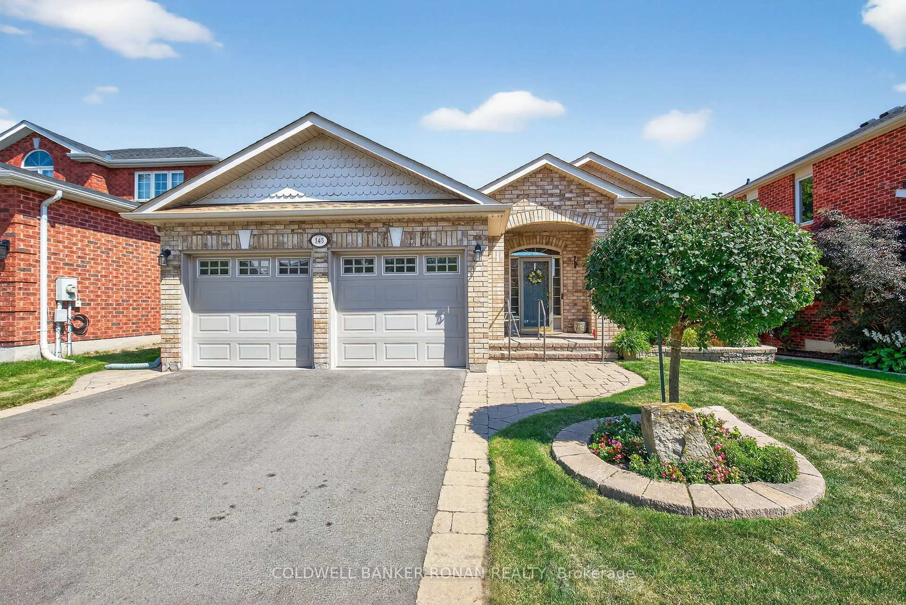 Home with brick exterior material, street for 145 Buchanan Dr, New Tecumseth Ontario L9R 0A4