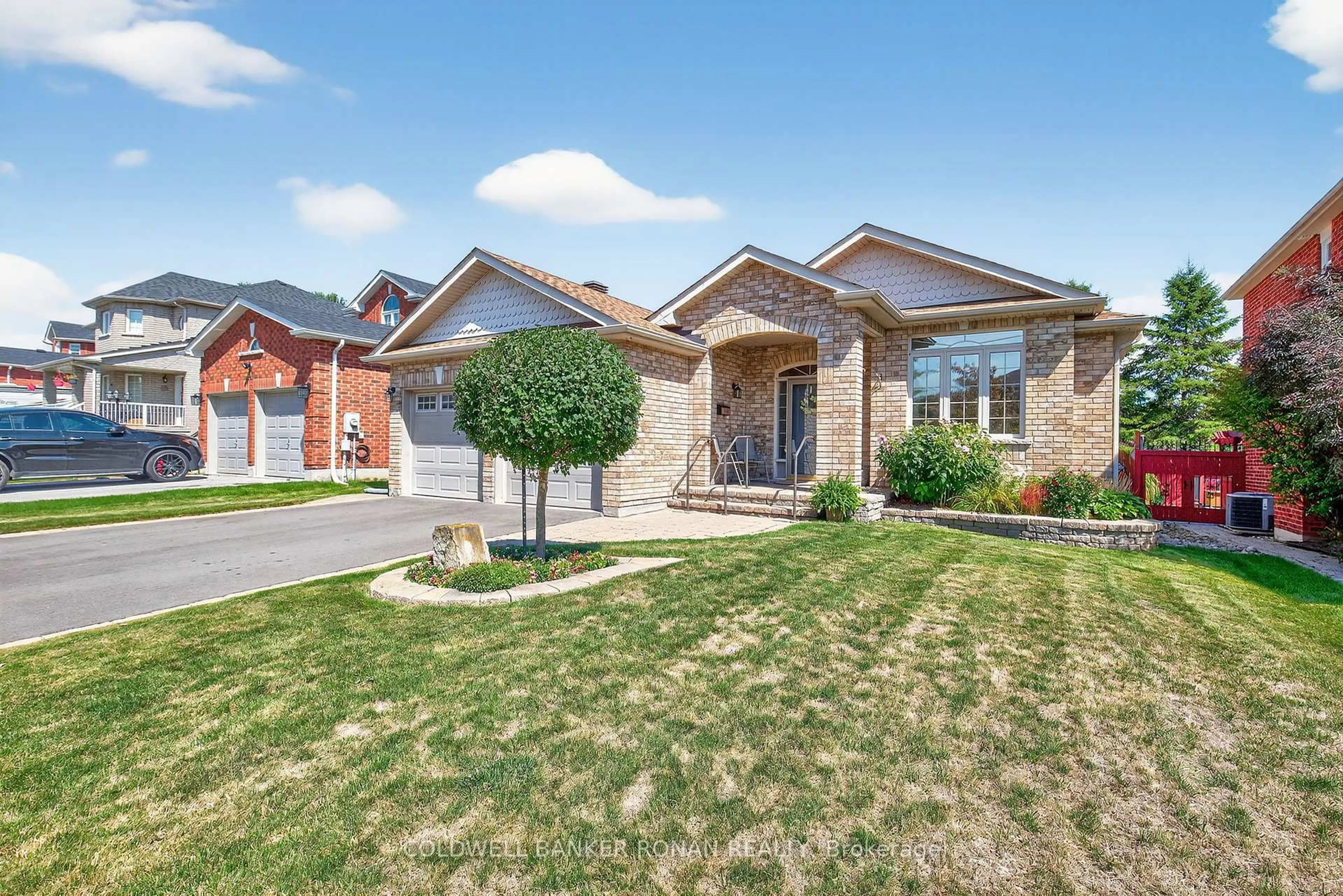 Home with brick exterior material, street for 145 Buchanan Dr, New Tecumseth Ontario L9R 0A4