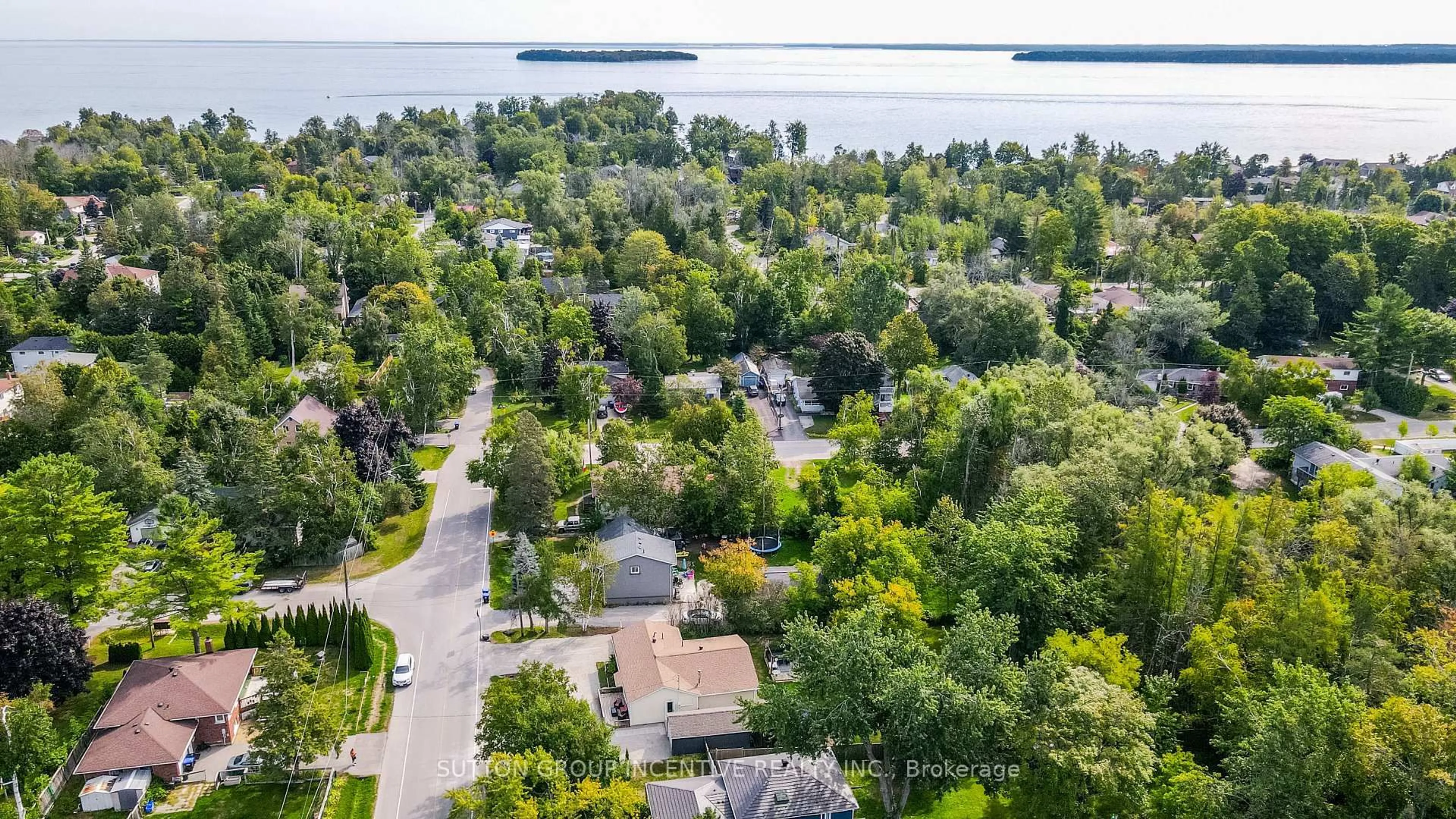 A pic from outside/outdoor area/front of a property/back of a property/a pic from drone, water/lake/river/ocean view for 761 William St, Innisfil Ontario L9S 2G3