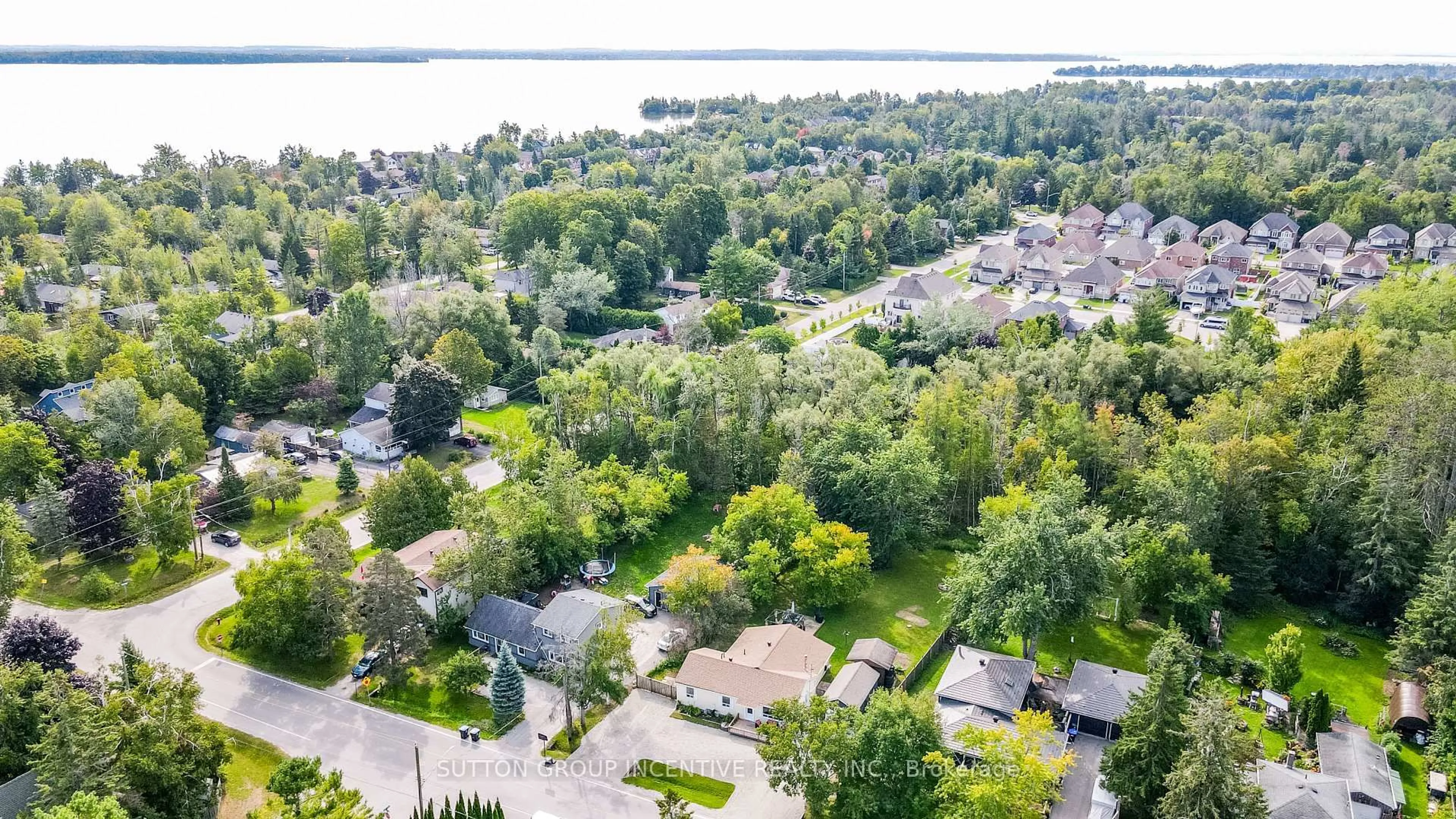 A pic from outside/outdoor area/front of a property/back of a property/a pic from drone, water/lake/river/ocean view for 761 William St, Innisfil Ontario L9S 2G3