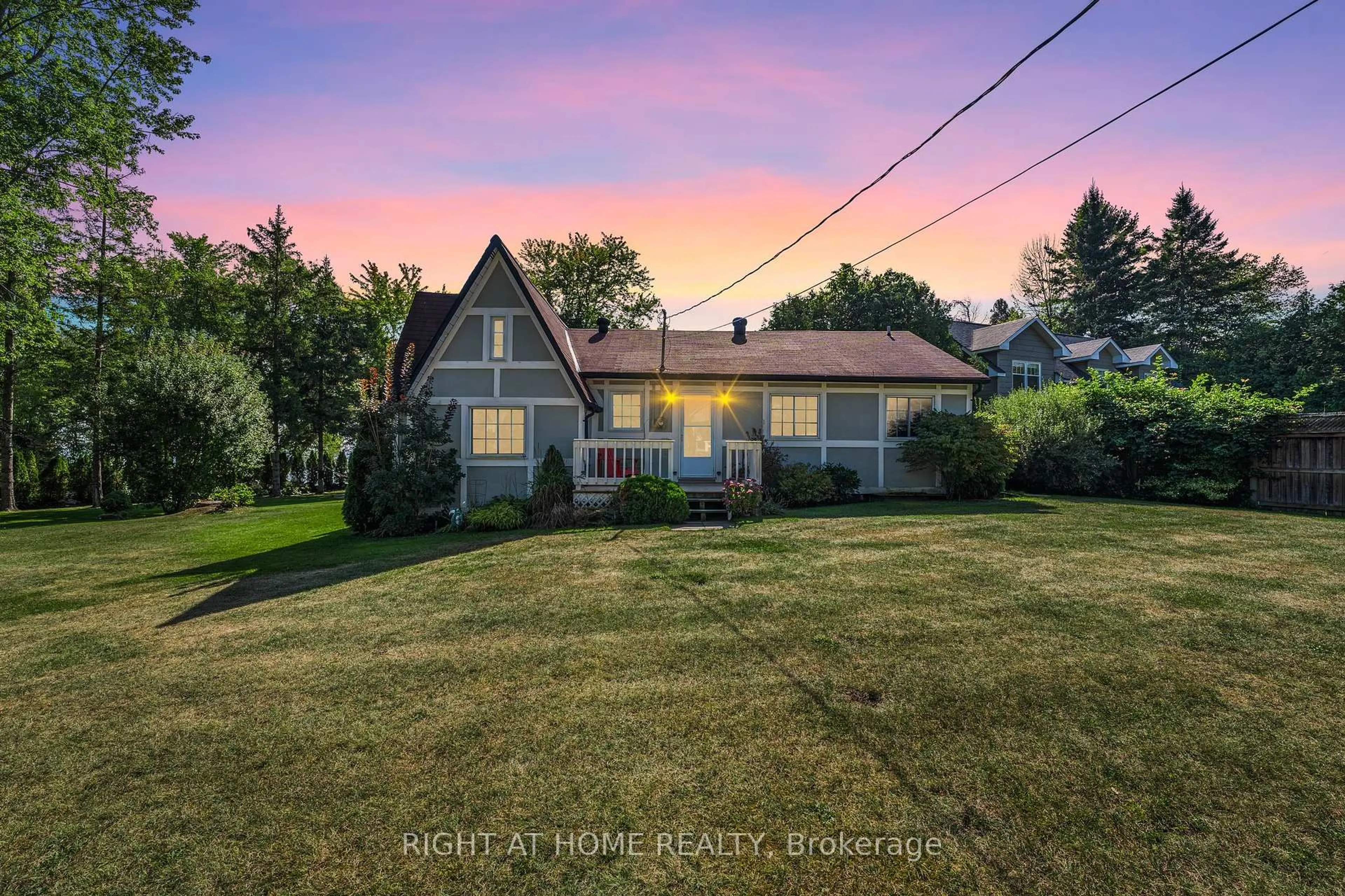 A pic from outside/outdoor area/front of a property/back of a property/a pic from drone, street for 113 Minnetonka Rd, Innisfil Ontario L9S 2V8