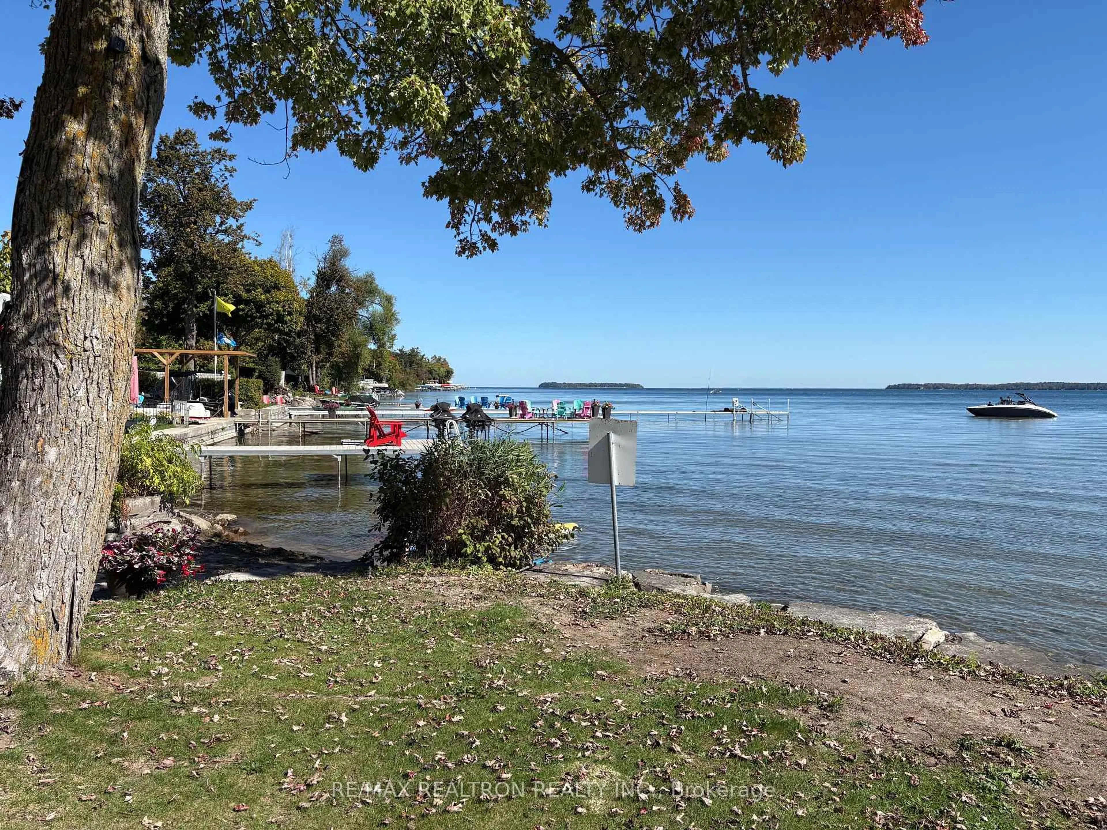 A pic from outside/outdoor area/front of a property/back of a property/a pic from drone, water/lake/river/ocean view for 911 Vicrol Dr, Innisfil Ontario L9S 1V4